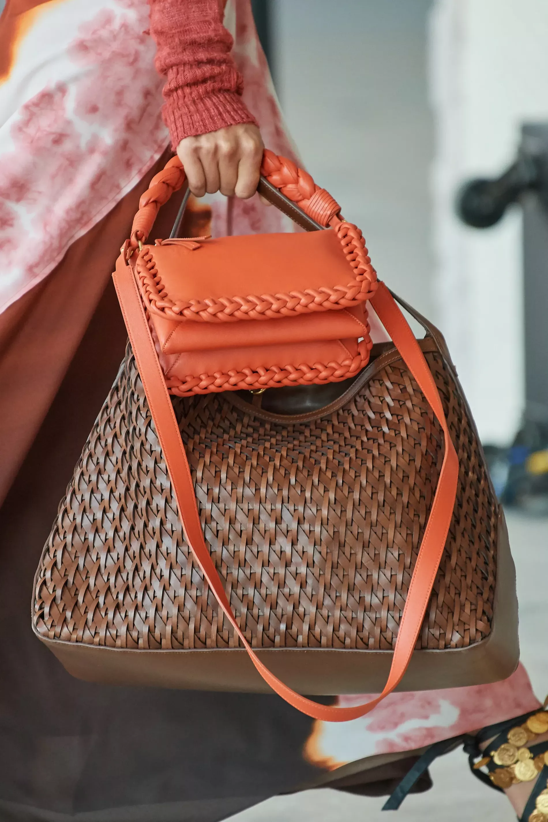 Orange braided top handle Altuzarra bag