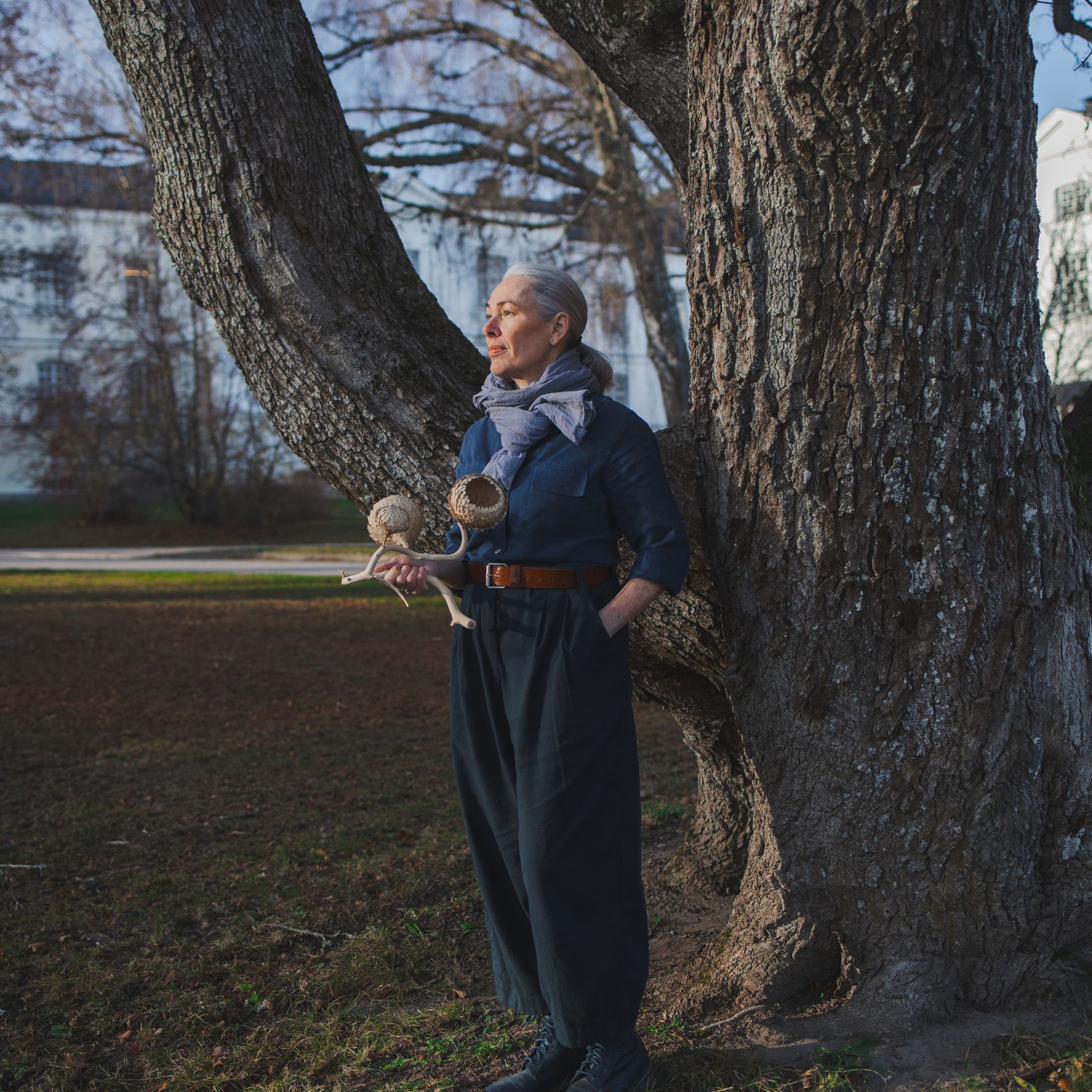 A woman standing in a park