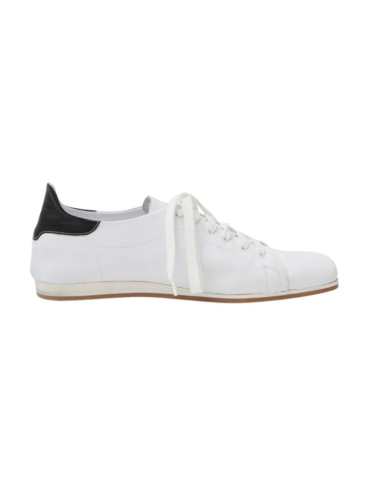 The best white low-profile sneakers by Tibi on a white background