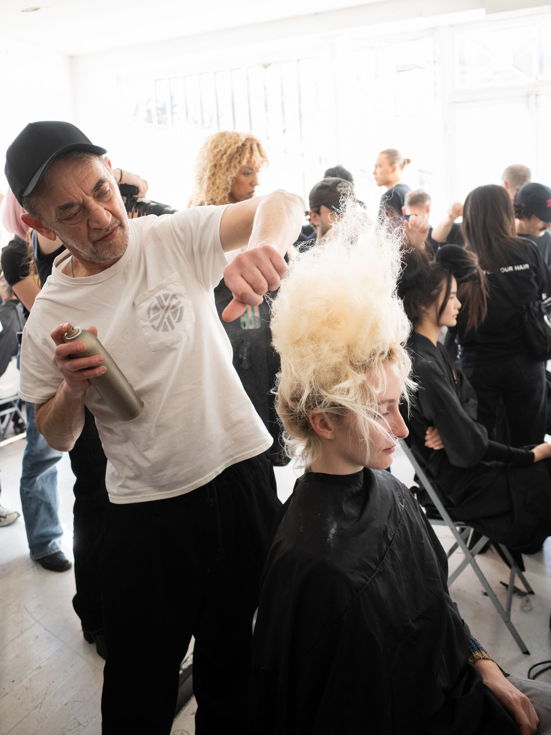 Eugene Souleiman working backstage