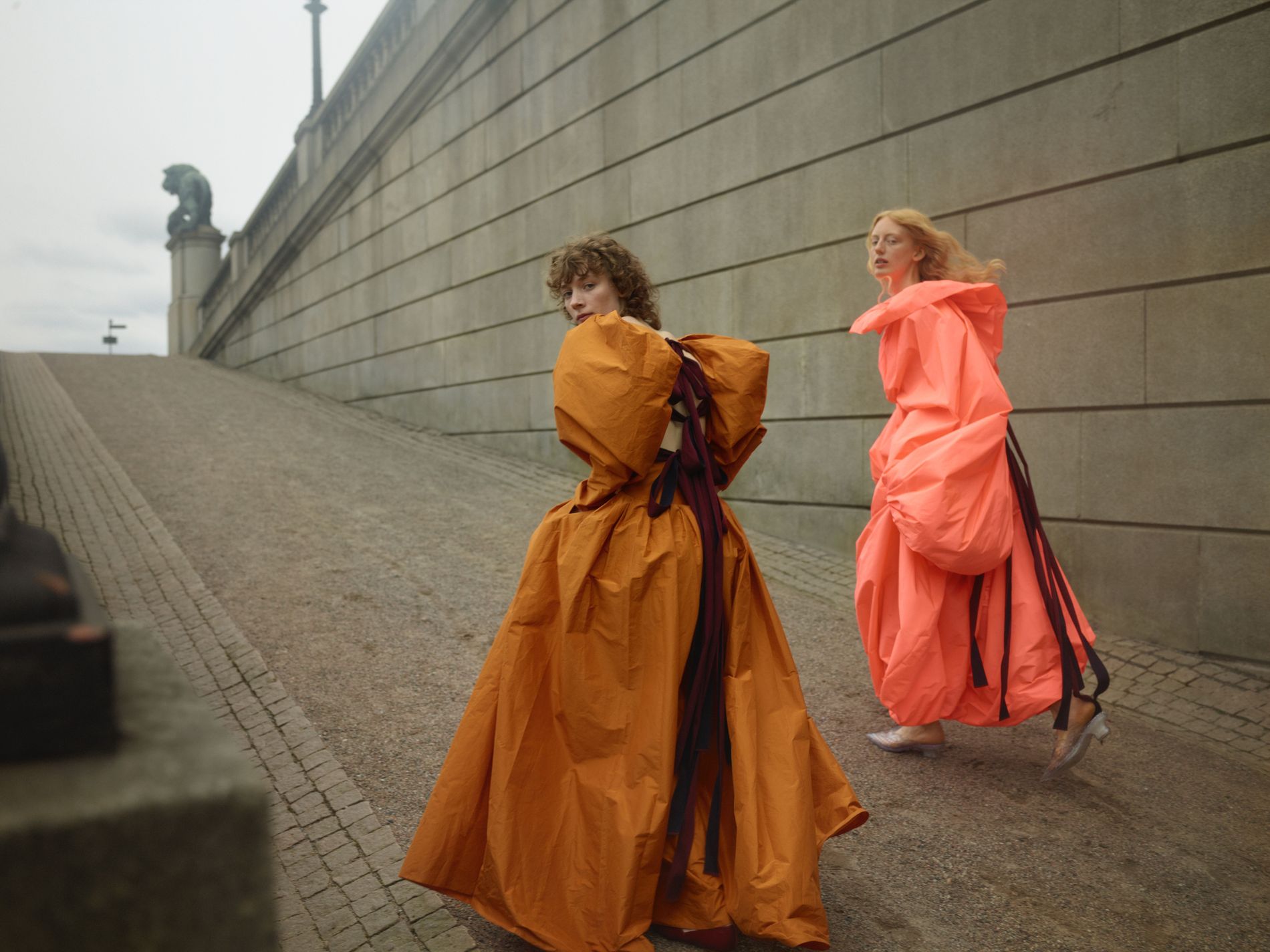 From left:  Jumpsuit, €2,395. Roksanda. Right: Jumpsuit, €2,995. Roksanda. Transparent shoes, €218. Y/Project.on Shoot