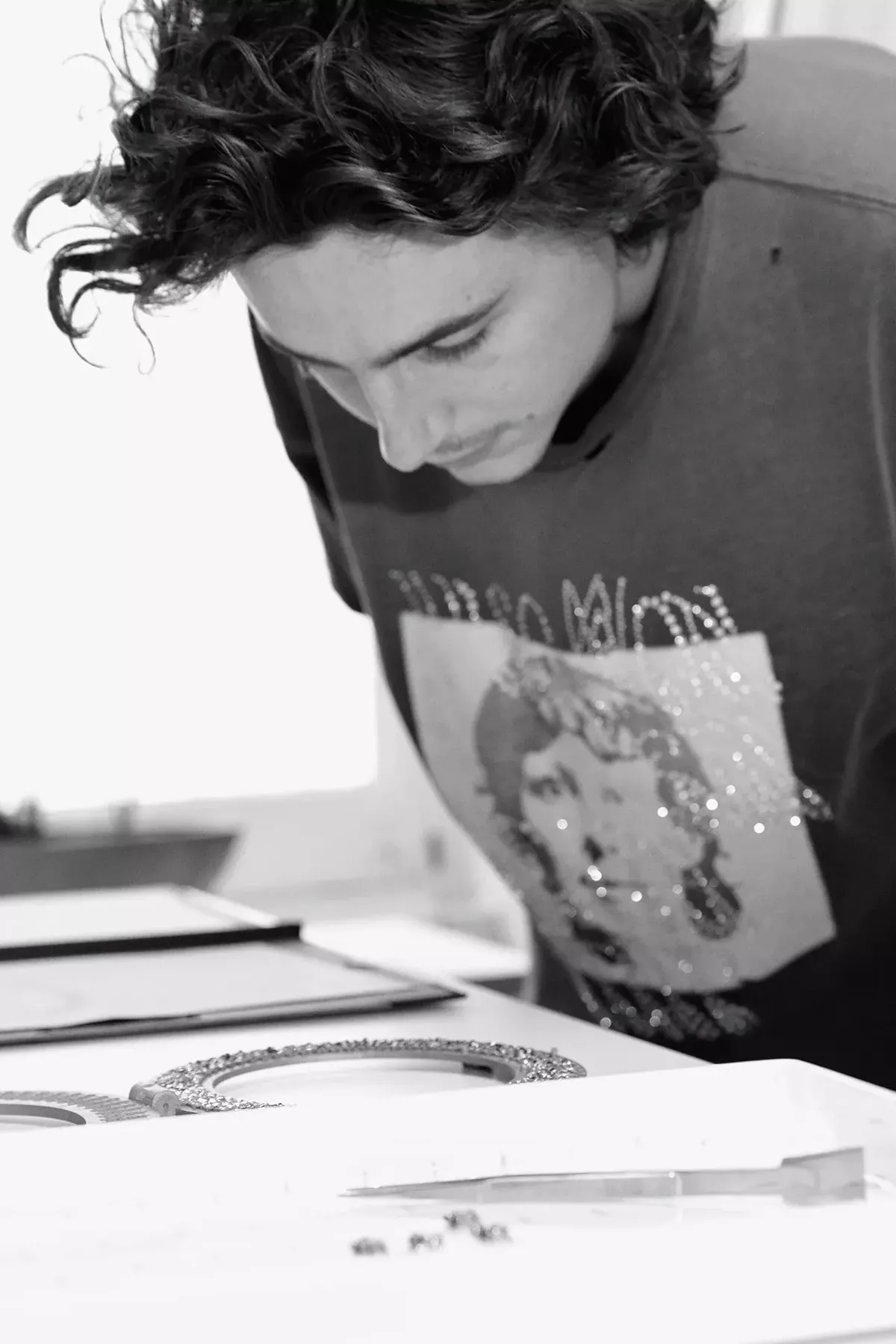 As likely to be spied in band tees and board shorts as Tom Ford tailoring, Chalamet says he is a fan of a “thin chain” when away from the red carpet.