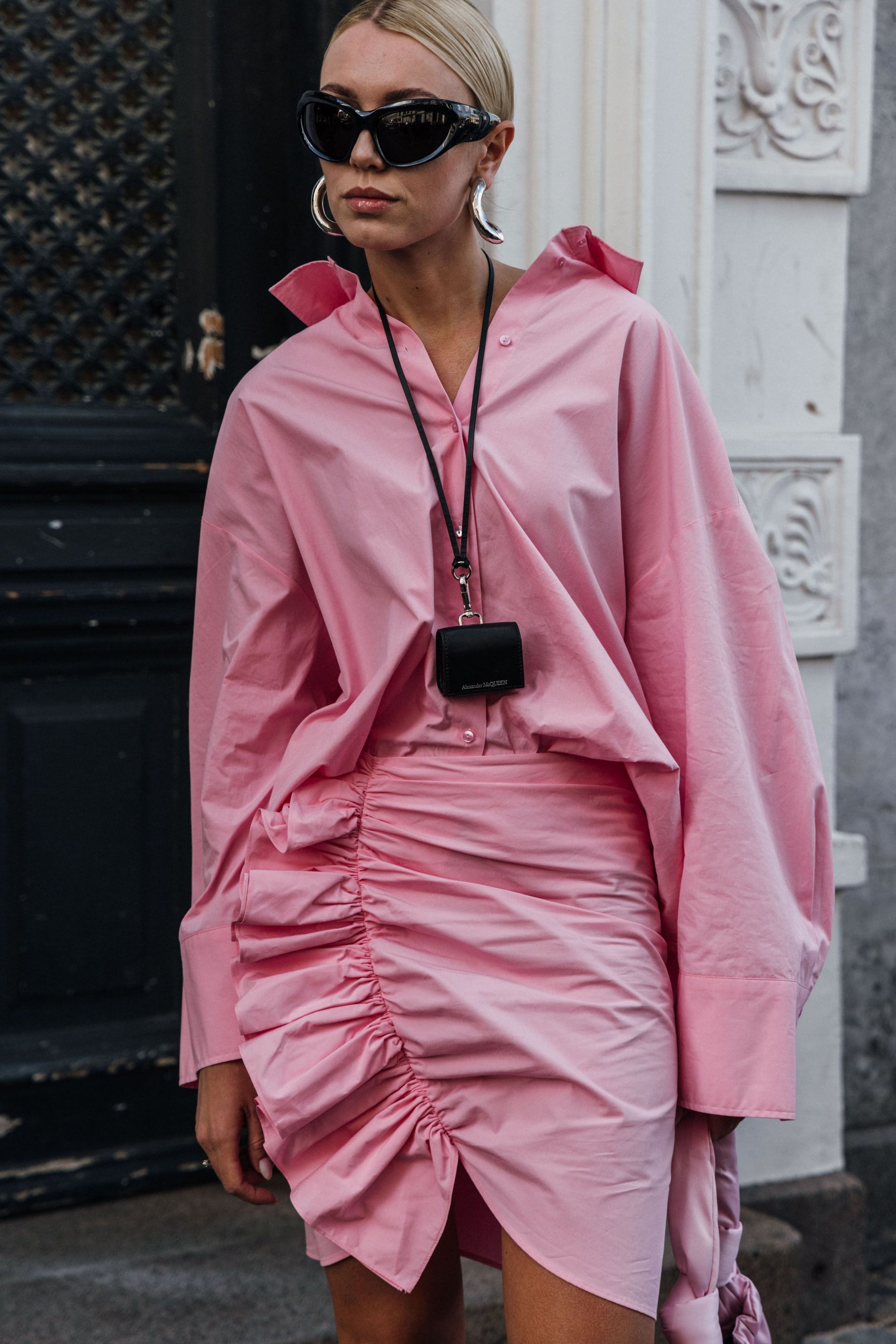 Guest wears a pair of silver statement earrings to Copenhagen Fashion Week SS24