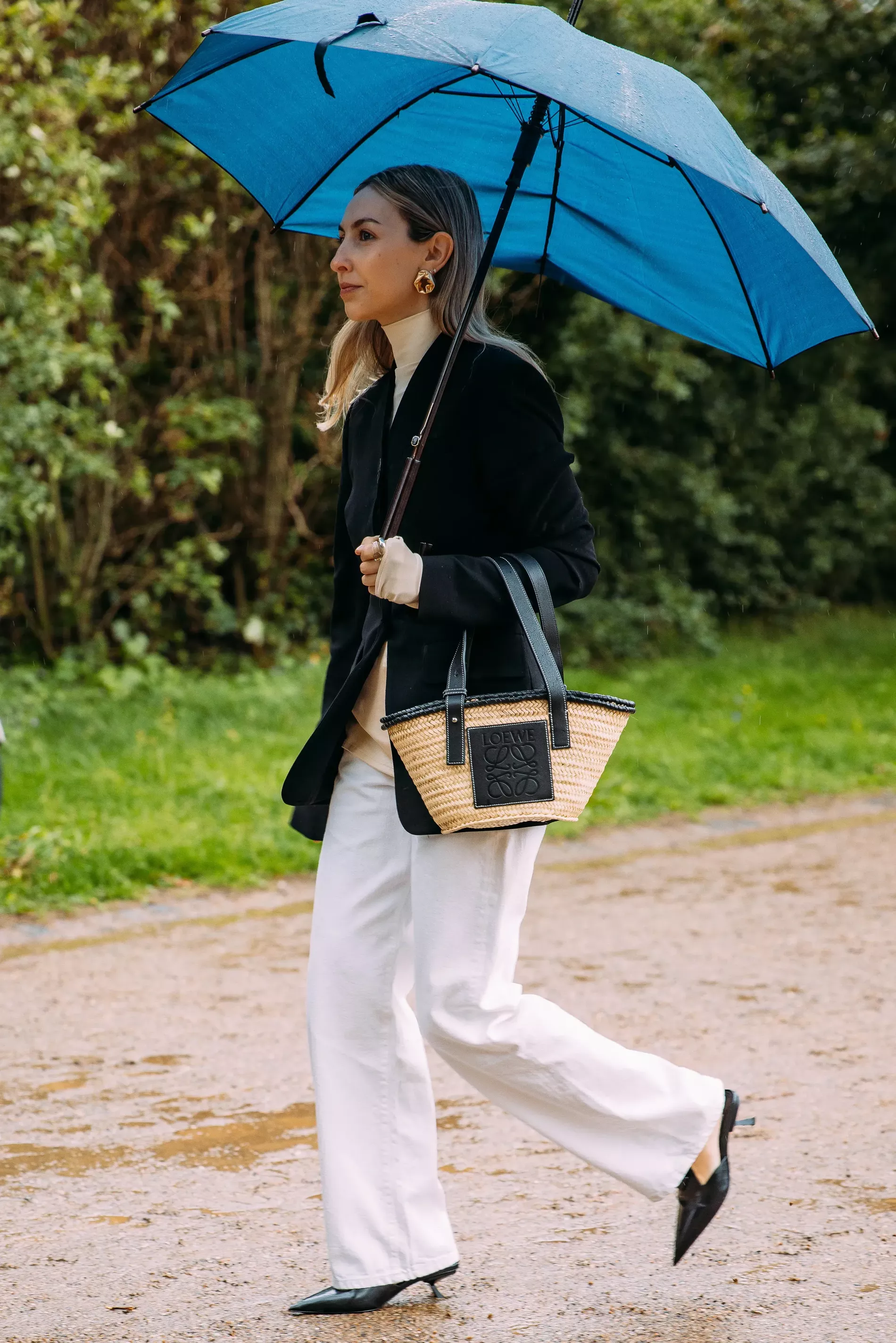 Guest attending a CPHFW SS24 show wears slingback loafers