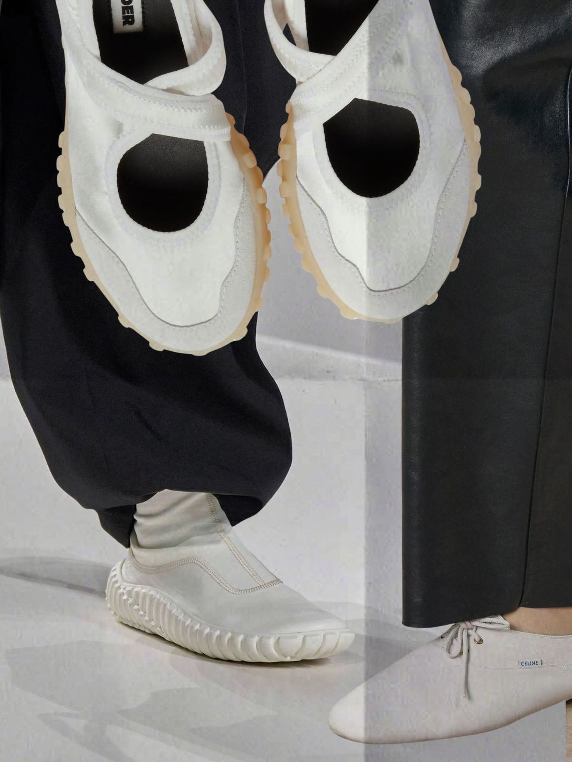 Models walking the SS26 runways of Bottega Veneta and Celine wear white sneakers