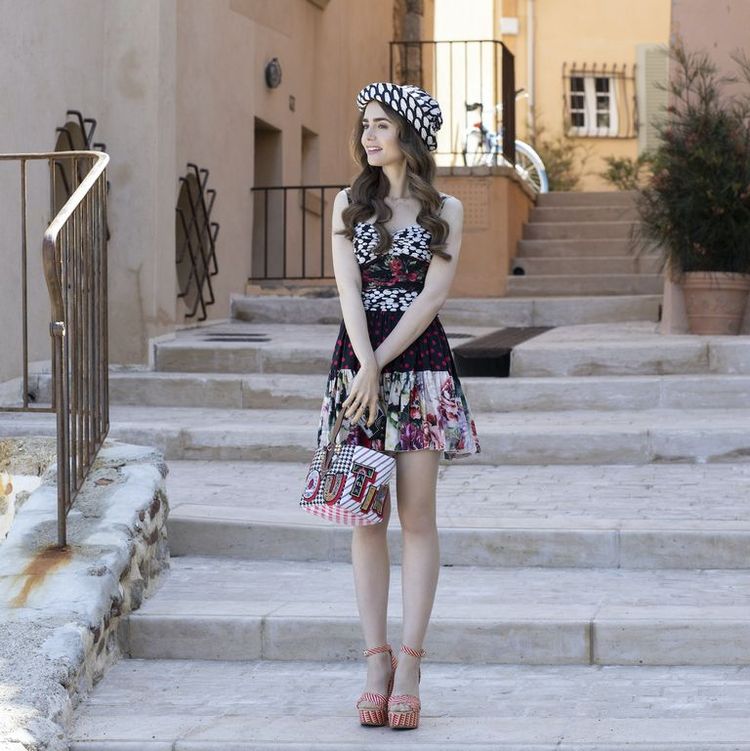 Lily Collins steps onto Emily In Paris set in ruffled lilac sundress teamed  with towering heels