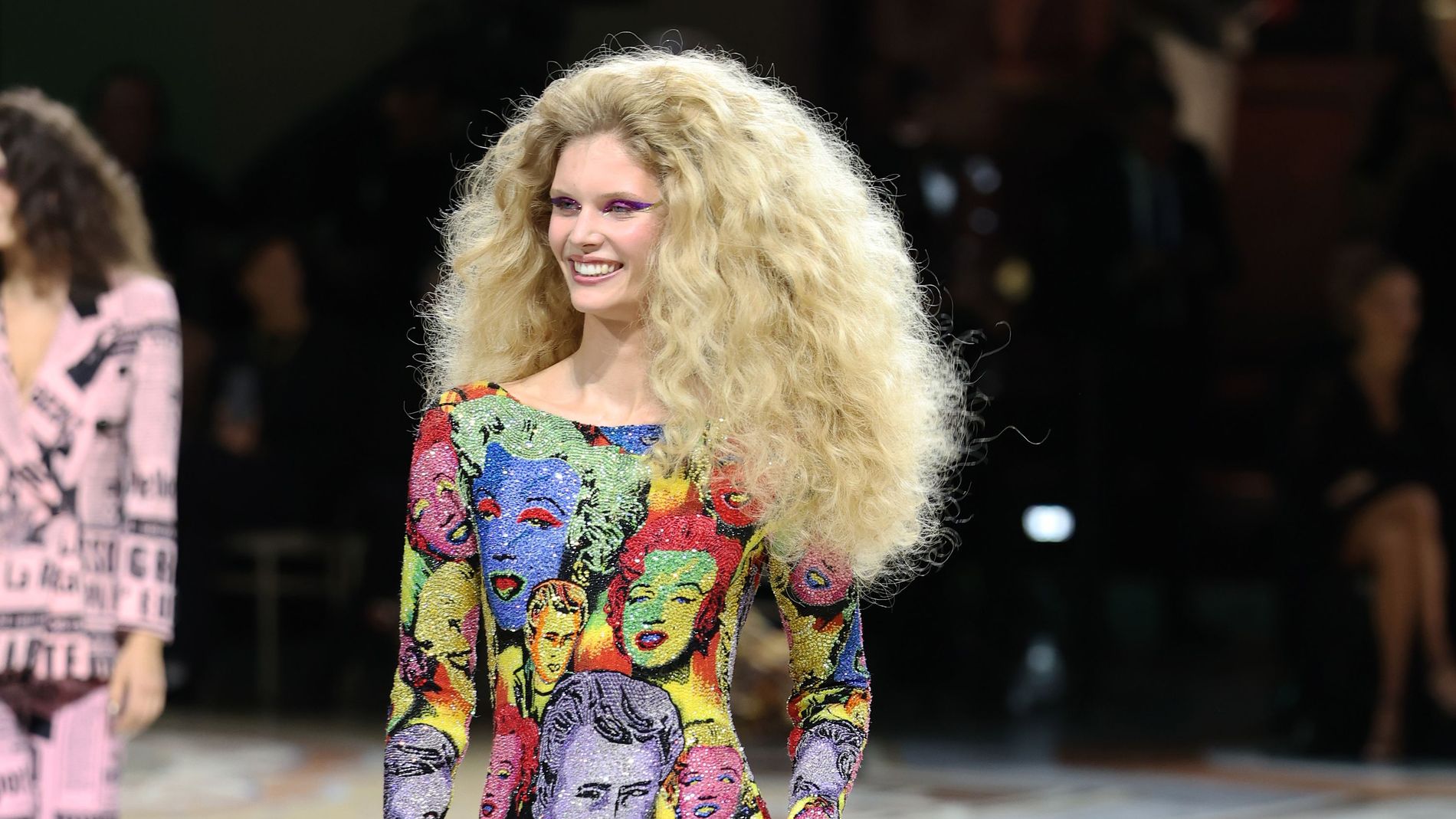 Ida Heiner in Milan fashion week wearing Andy Warhol-inspired pop art bodysuit with a Marilyn Monroe and James Dean print from Versace's Spring 2018 tribute collection