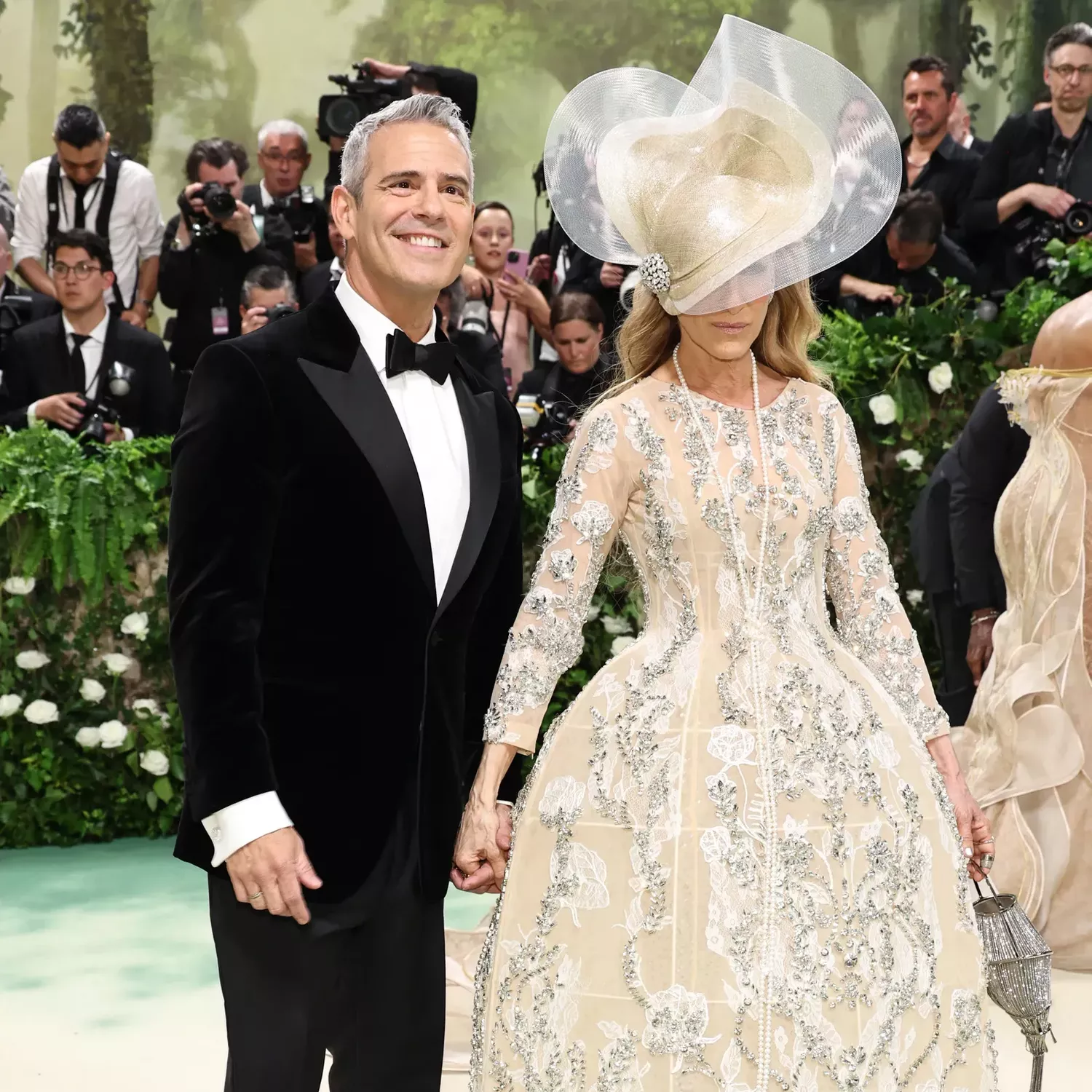 Andy Cohen in Berluti and Sarah Jessica Parker in Richard Quinn