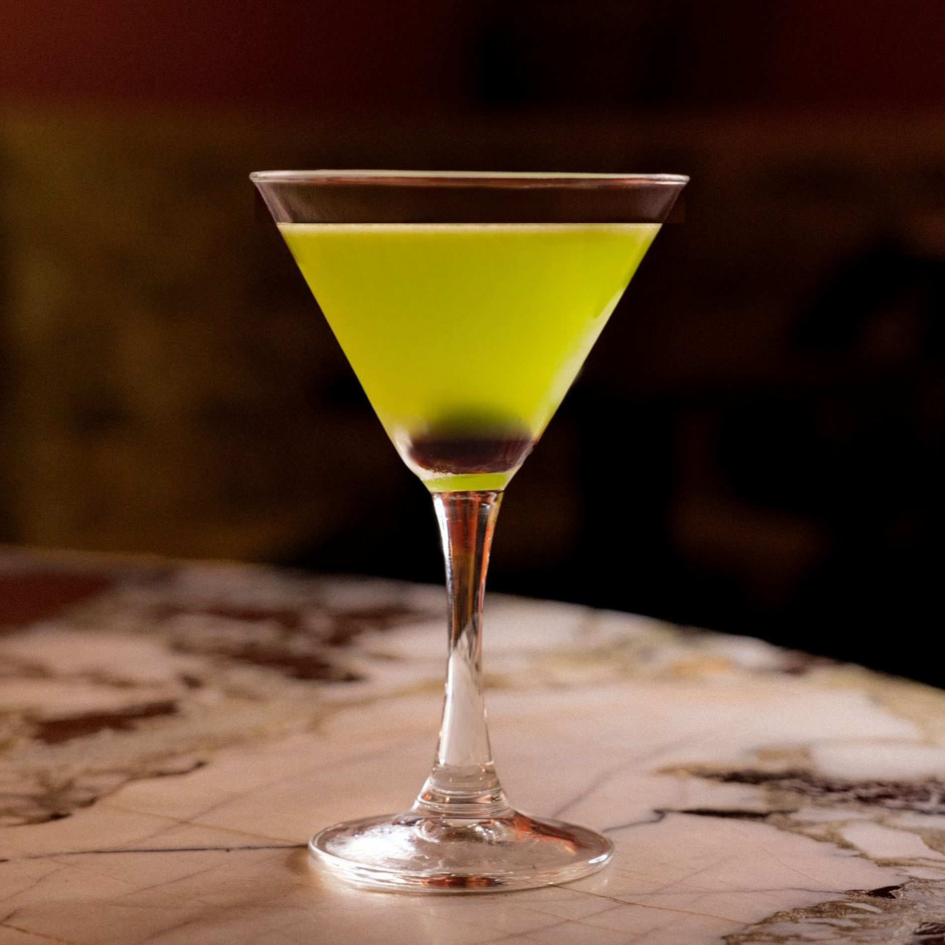 A bright green Halloween cocktail