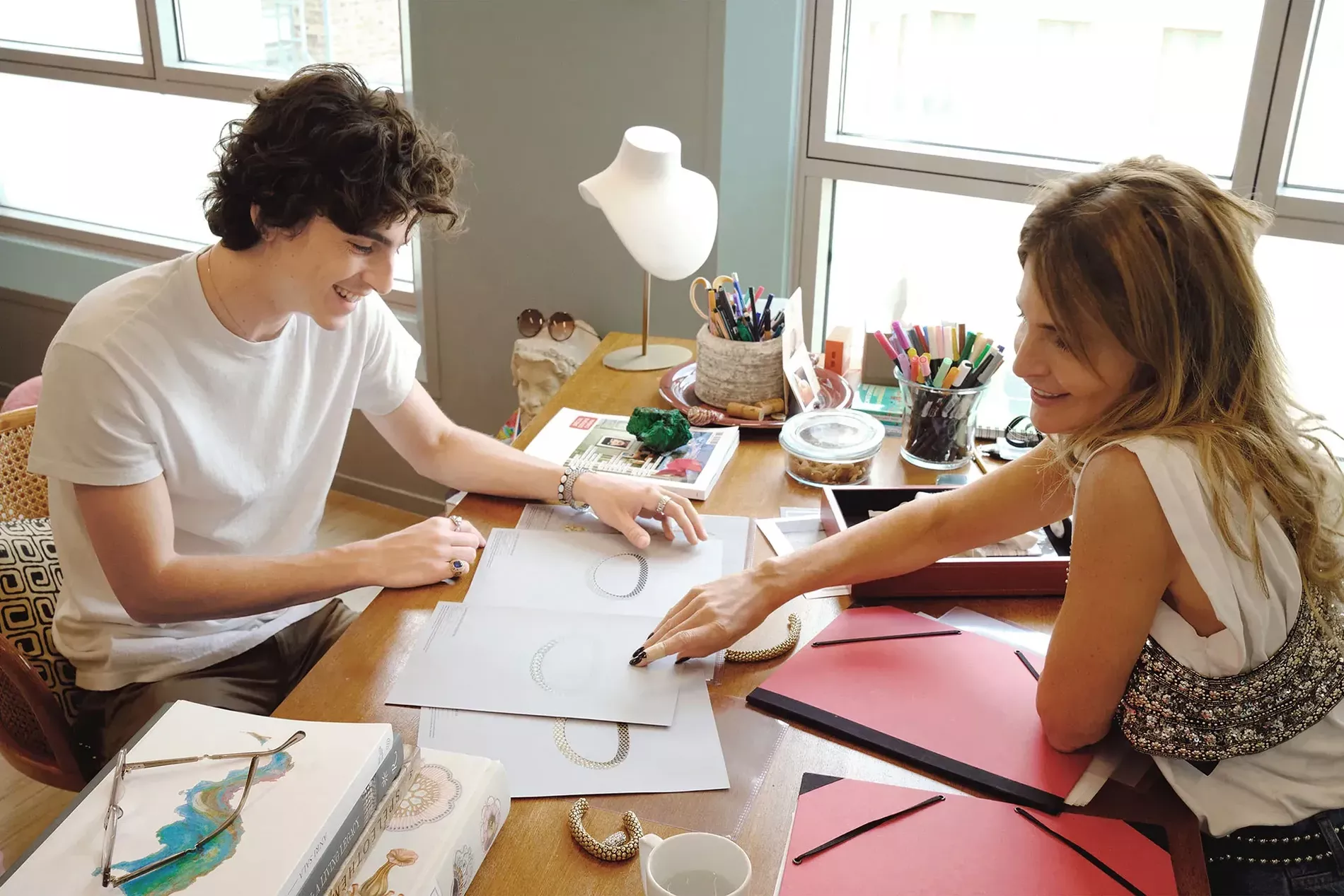 Chalamet with Cartier’s creative director of jewellery and watchmaking, Marie-Laure Cérède, in the atelier in Paris.
