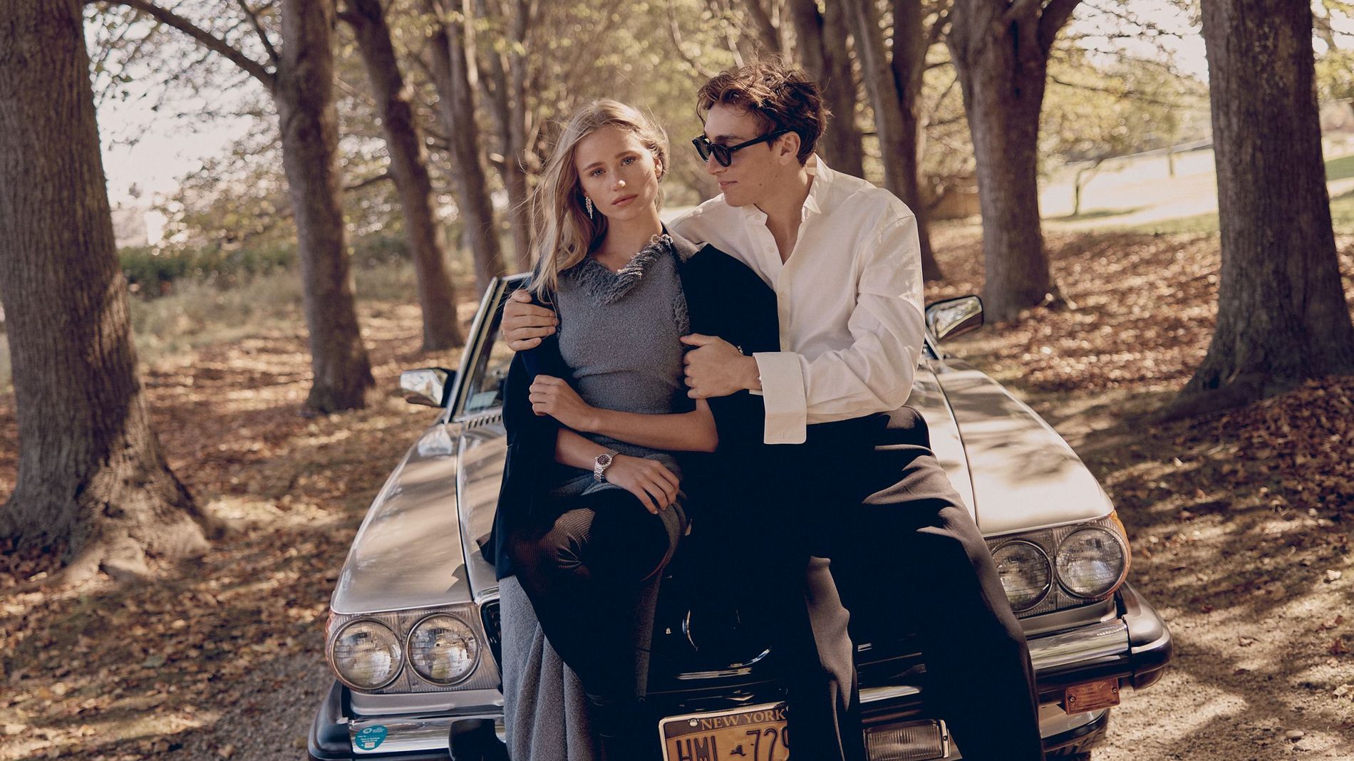 Stylish young couple embracing on a sunny fall day 
