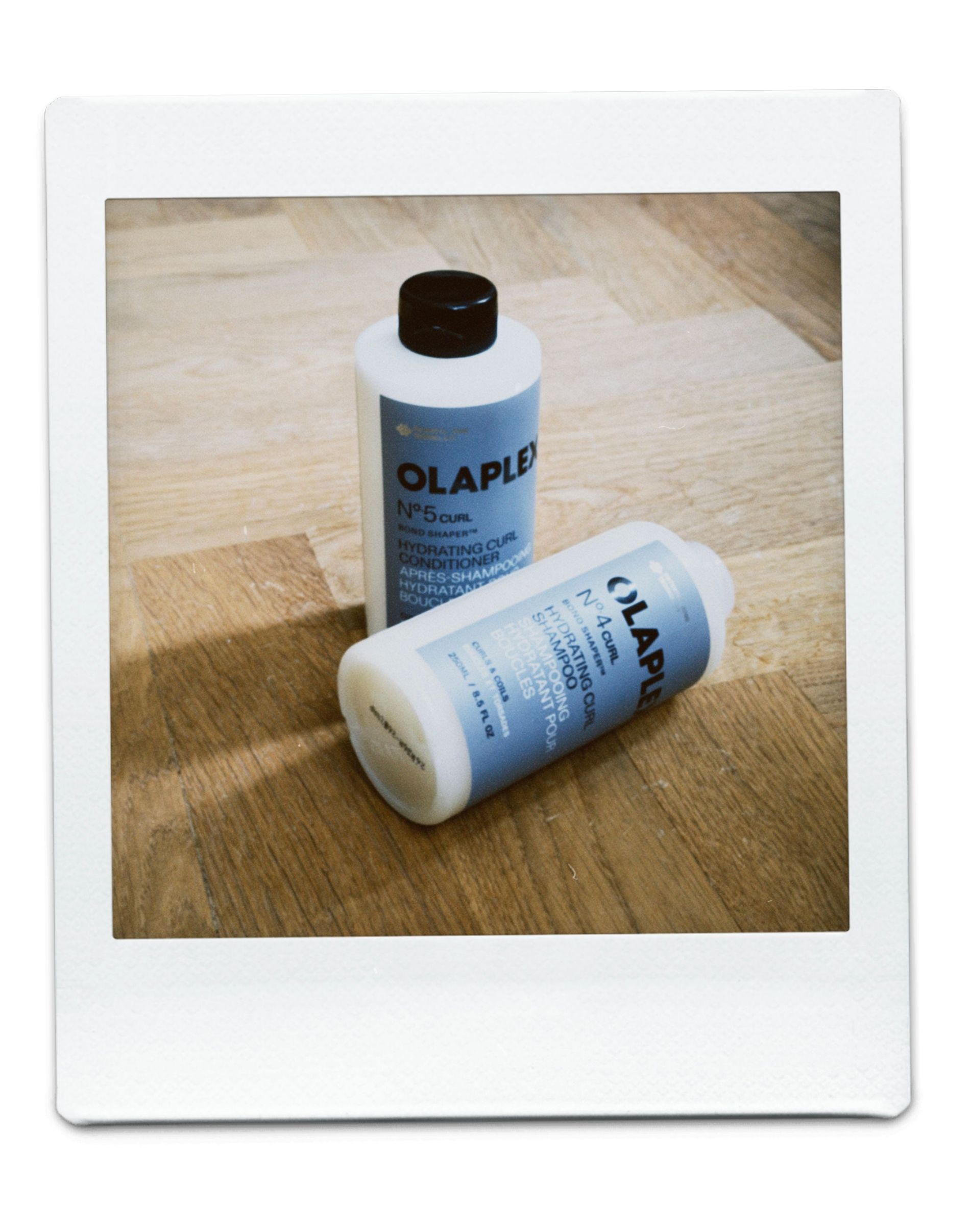 White bottle with black text on it