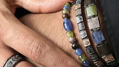 Three luxury beaded and square-beaded macramé cord bracelets and a matching ring that appear to be from Shamballa Jewels, showcasing precious stones like tanzanite and sapphires set in 18K gold with intricate beadwork