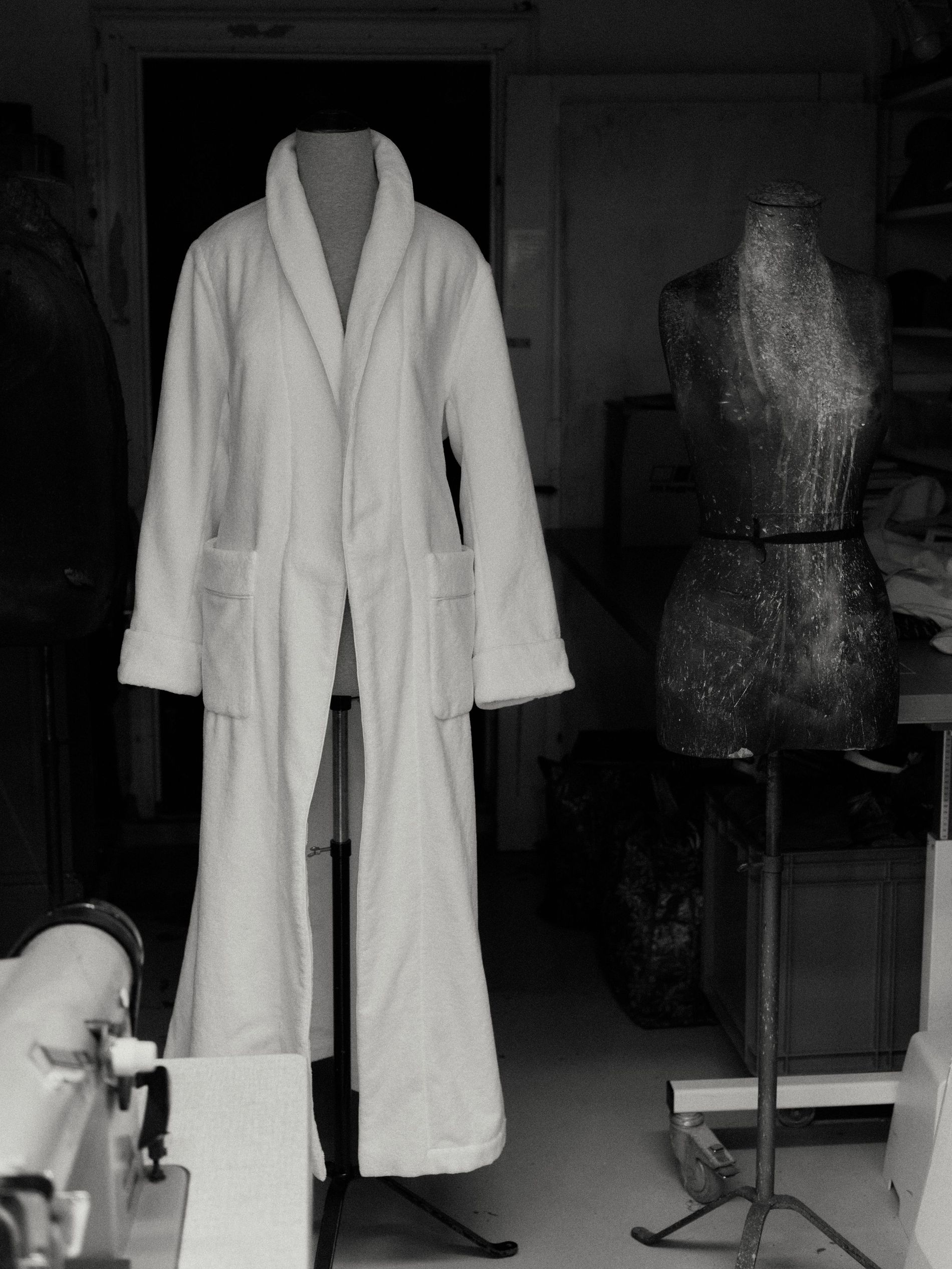 A mannequin covered in a robe by Benon