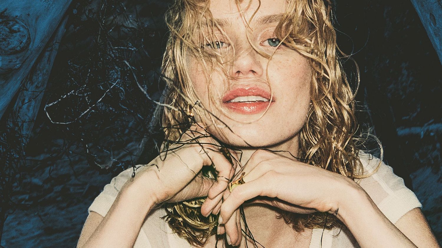 Model poses with wet hair