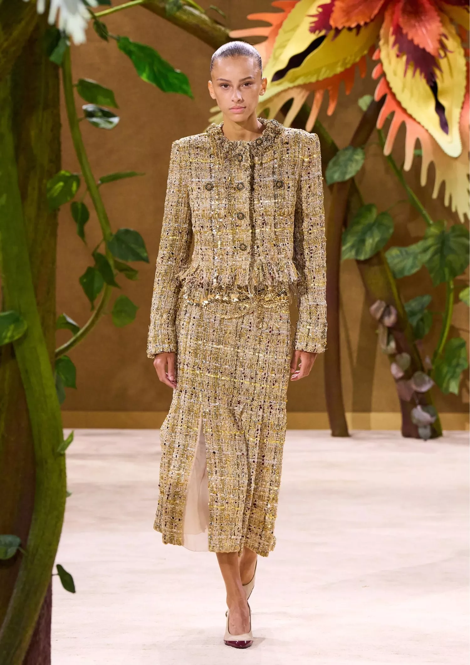 Matching golden sett consisting of a jacket and mid skirt