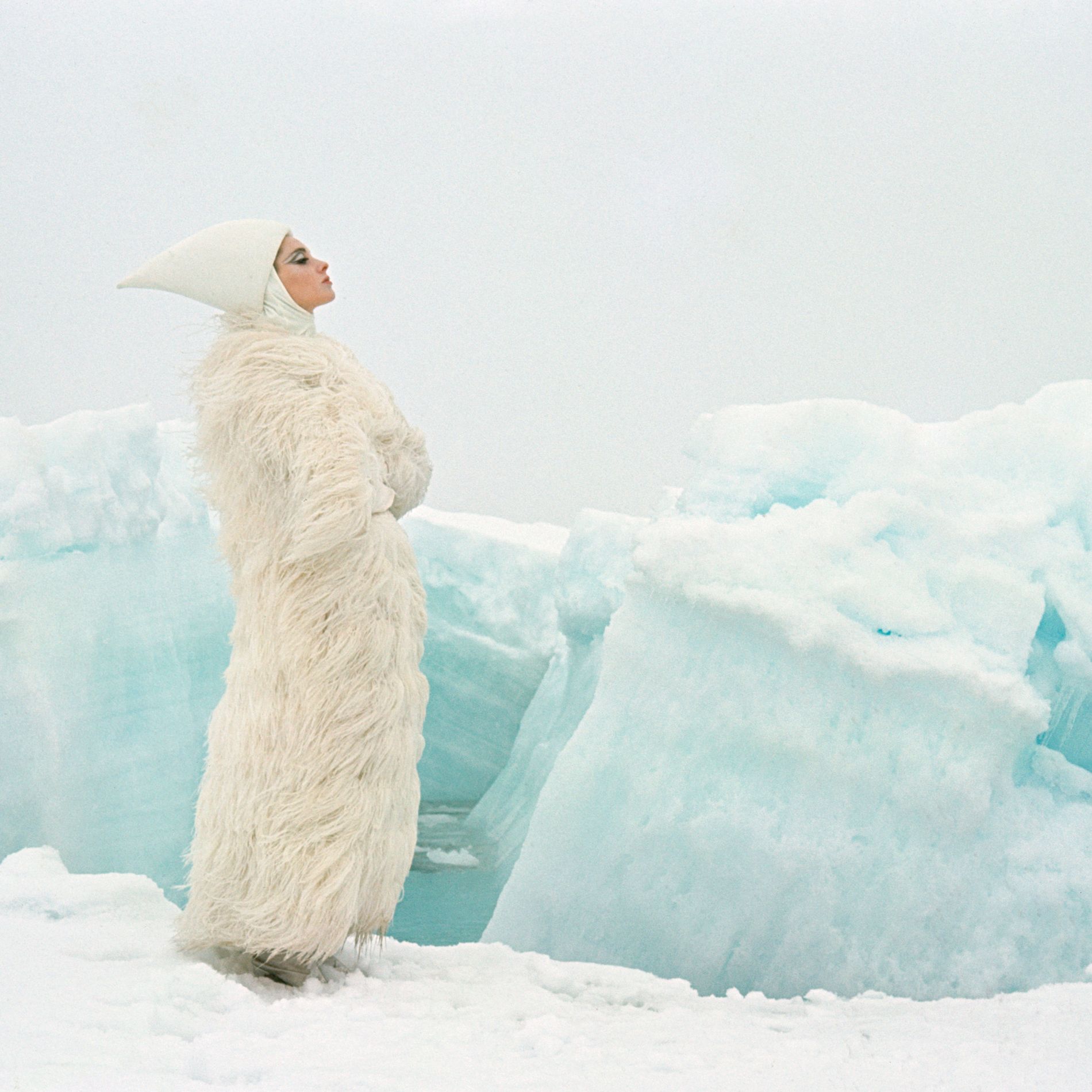 Ice fashion editorial winter snow wooly coat christmas