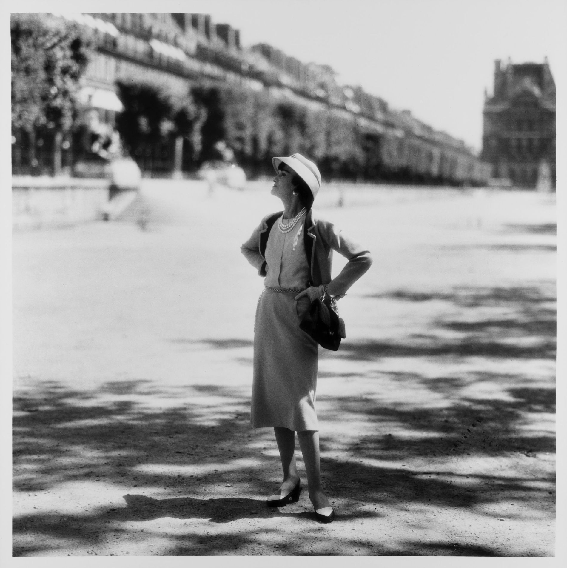 Mademoiselle Chanel at the Jardin des Tuileries. Paris - 1960 by Willy Rizzo