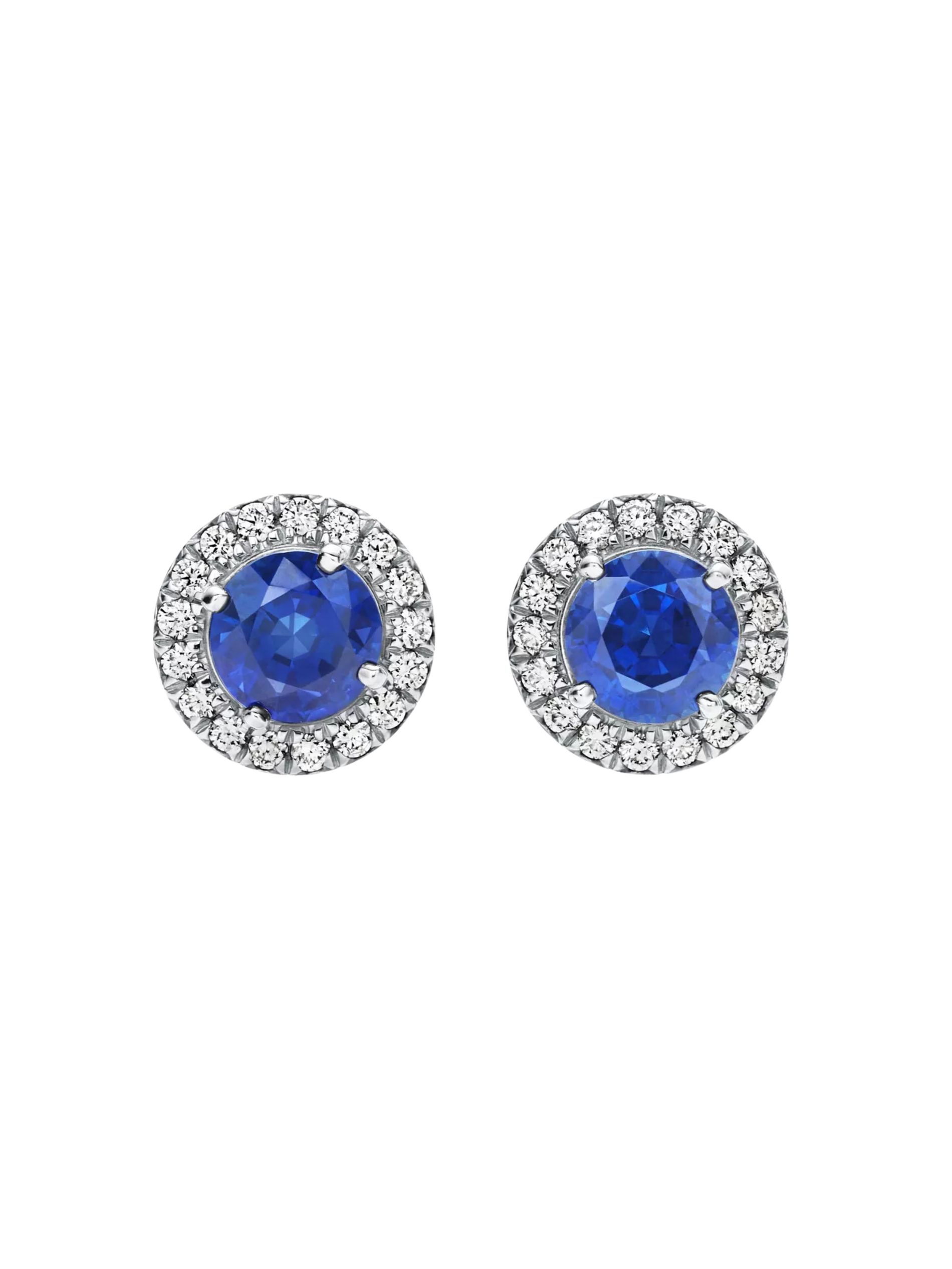Sapphire and diamond stud earrings from Tiffany & Co against a white background