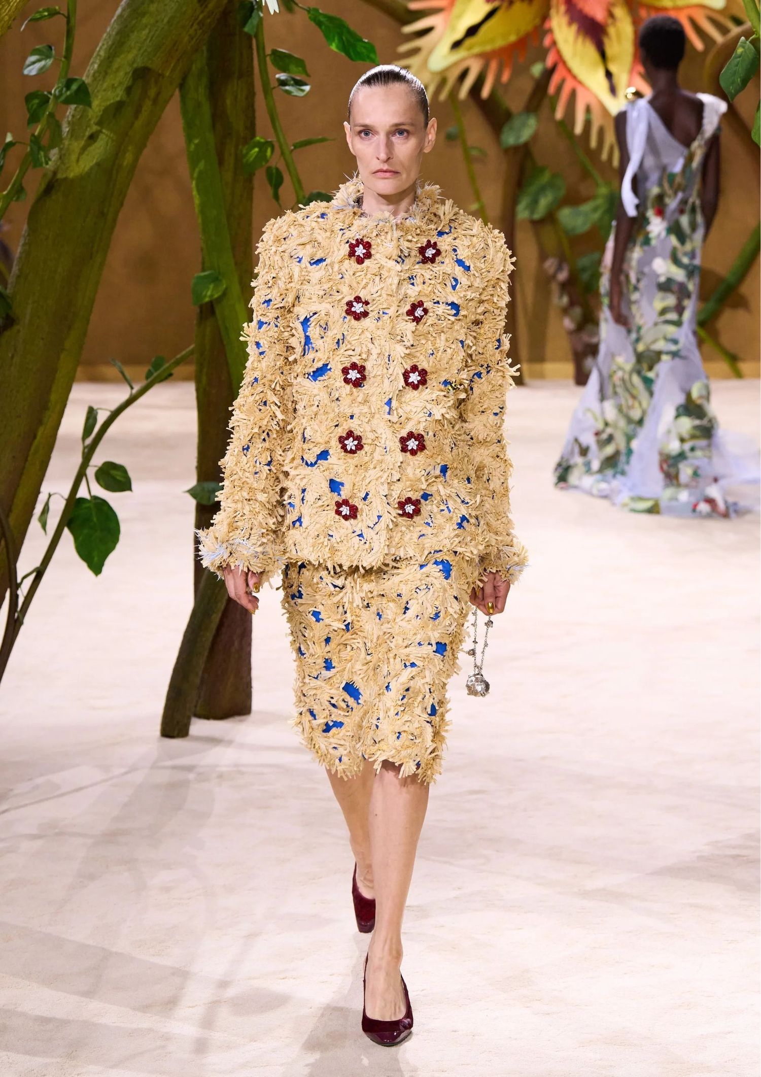 Beige fringe set consisting of a skirt and a jacket with flowers