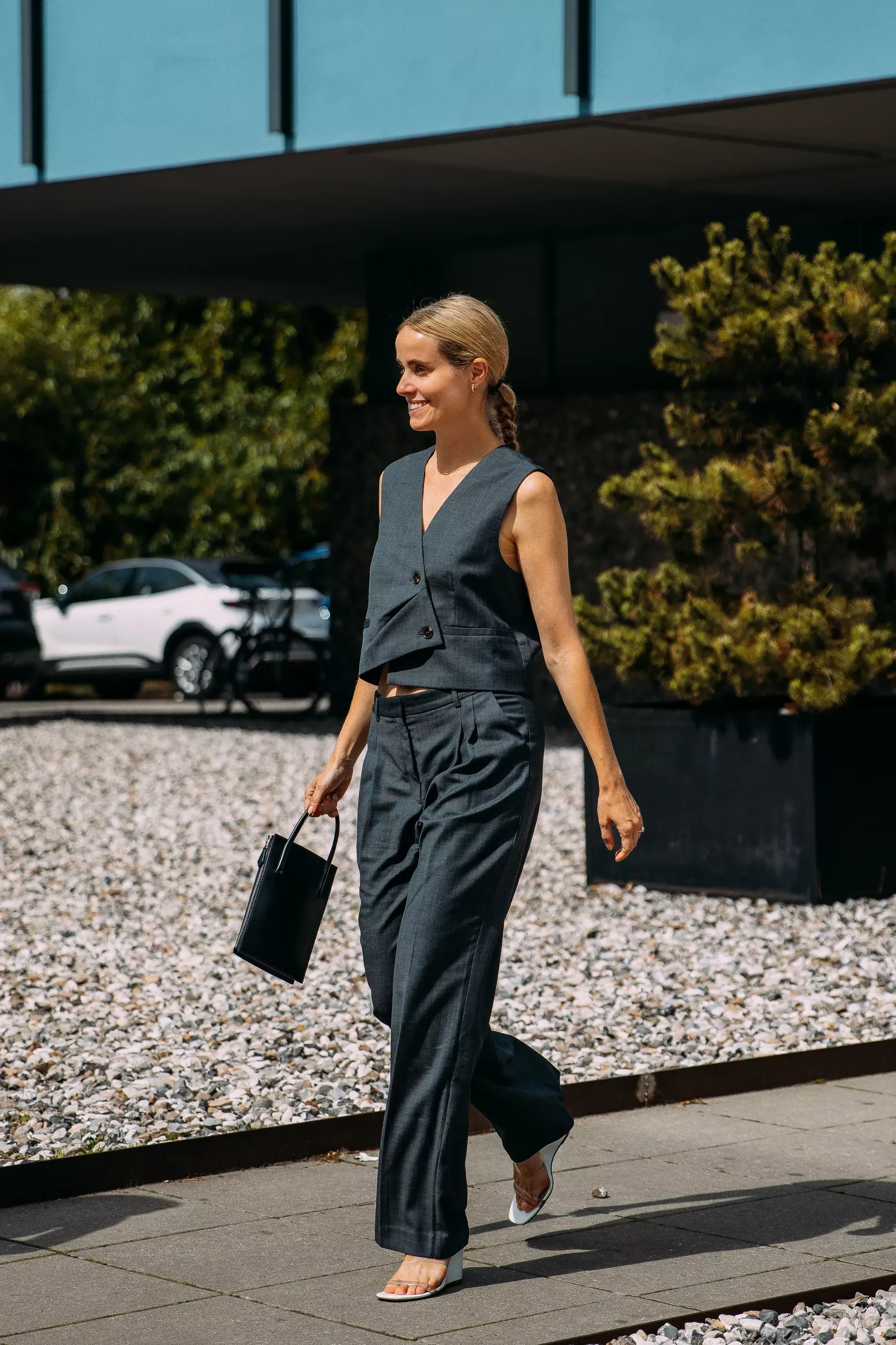 Copenhagen Fashion Week guest wears dark grey set 