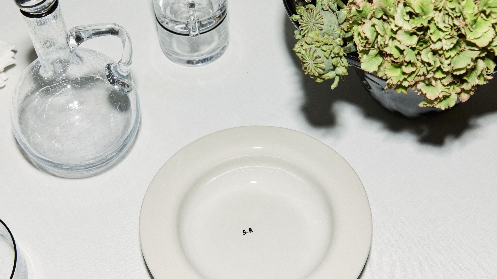 Table scape of Sophia Roe's interior collaboration, highlighting the S.R plate