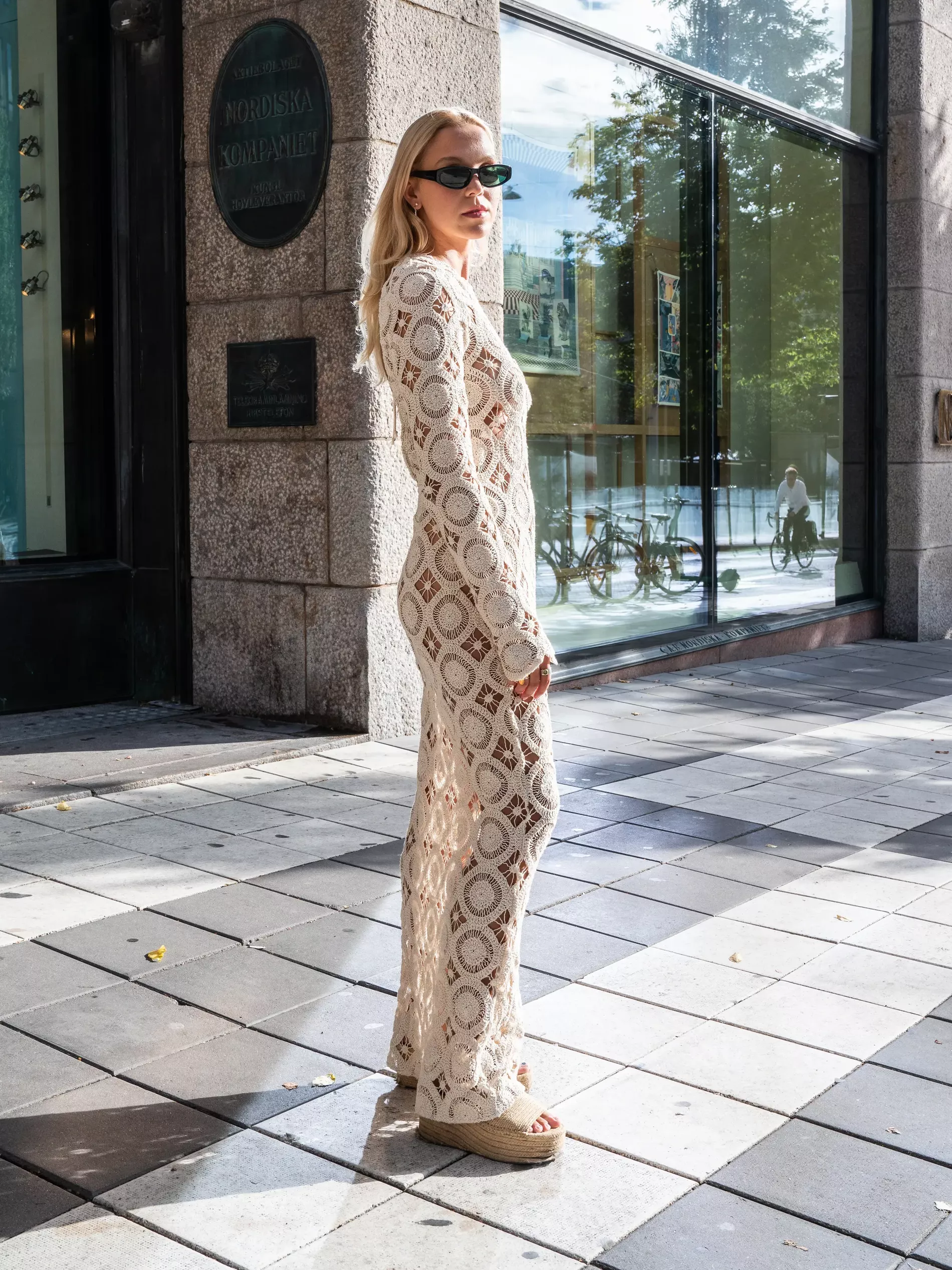 Stockholm fashion week guest wears crochet long sleeve dress 
