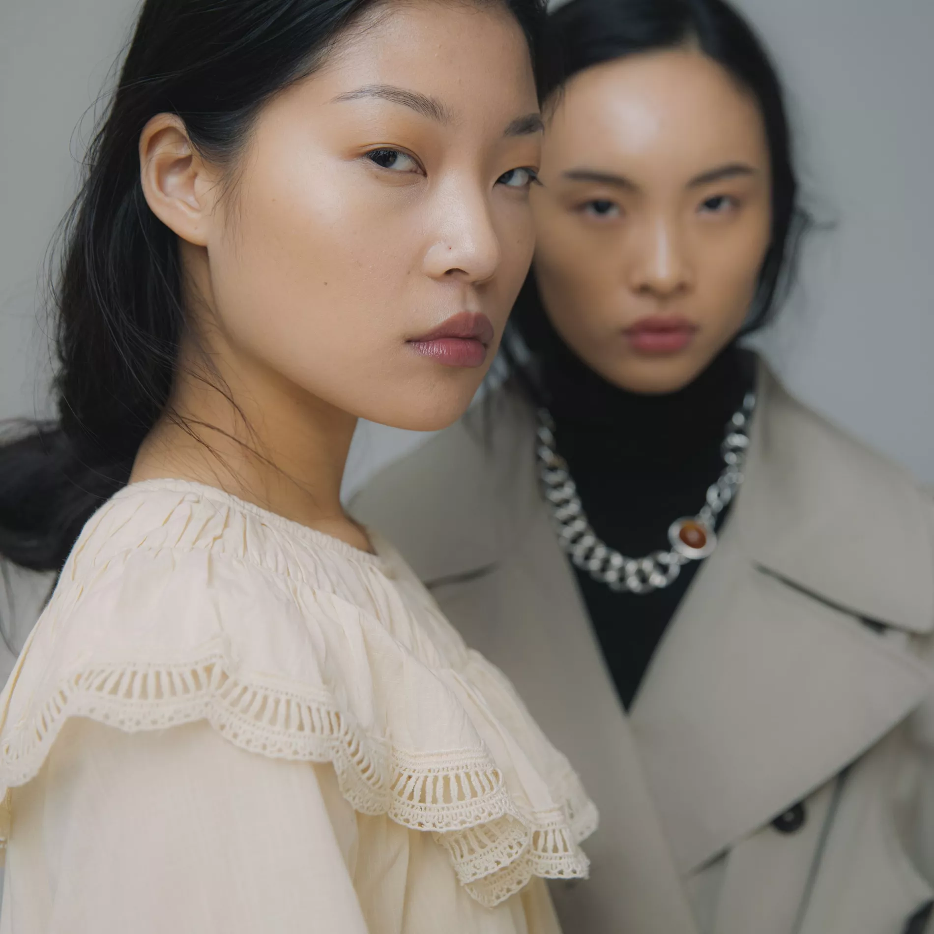 Two models pose backstage during Copenhagen fashion week 