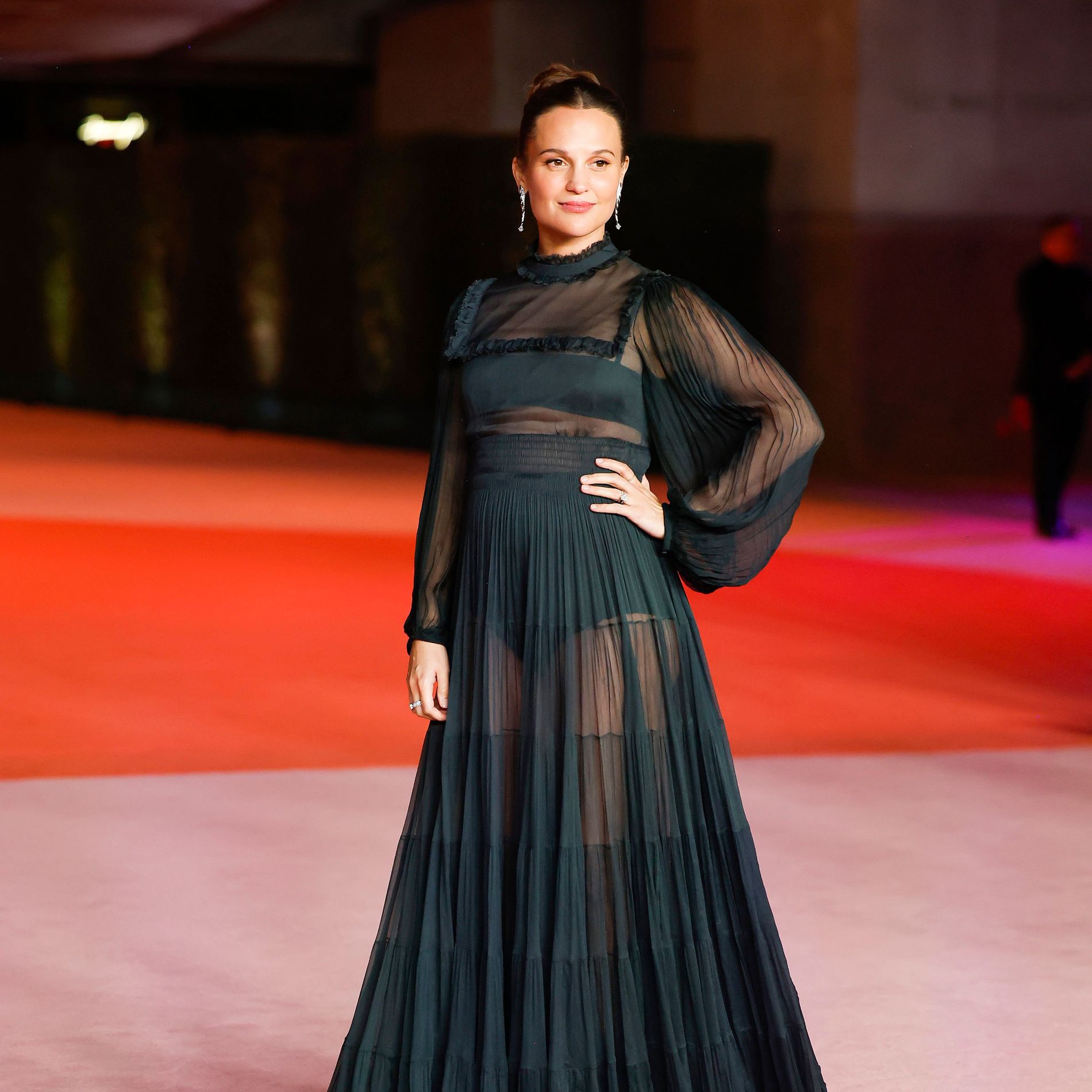 Alicia Vikander wears a sheer Louis Vuitton dress to the Academy Museum of Motion Pictures 3rd annual gala