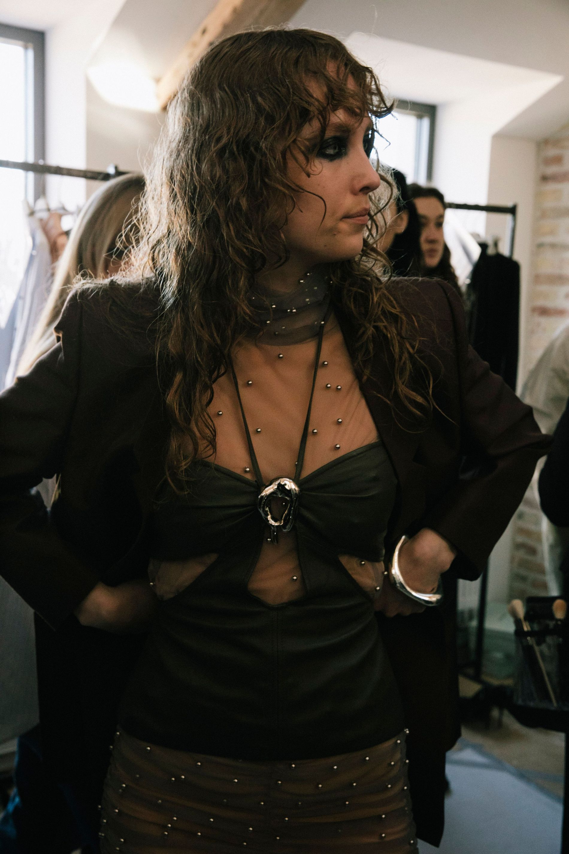 Model with wavy hair poses backstage at Munthe CPHFW AW23