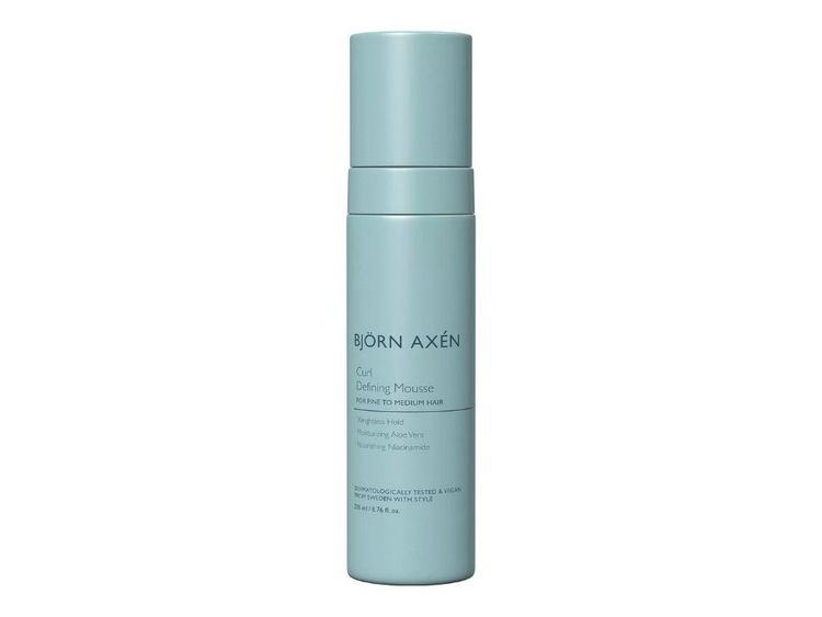 The best mousse for curly hair by Bjorn Axen on a white background