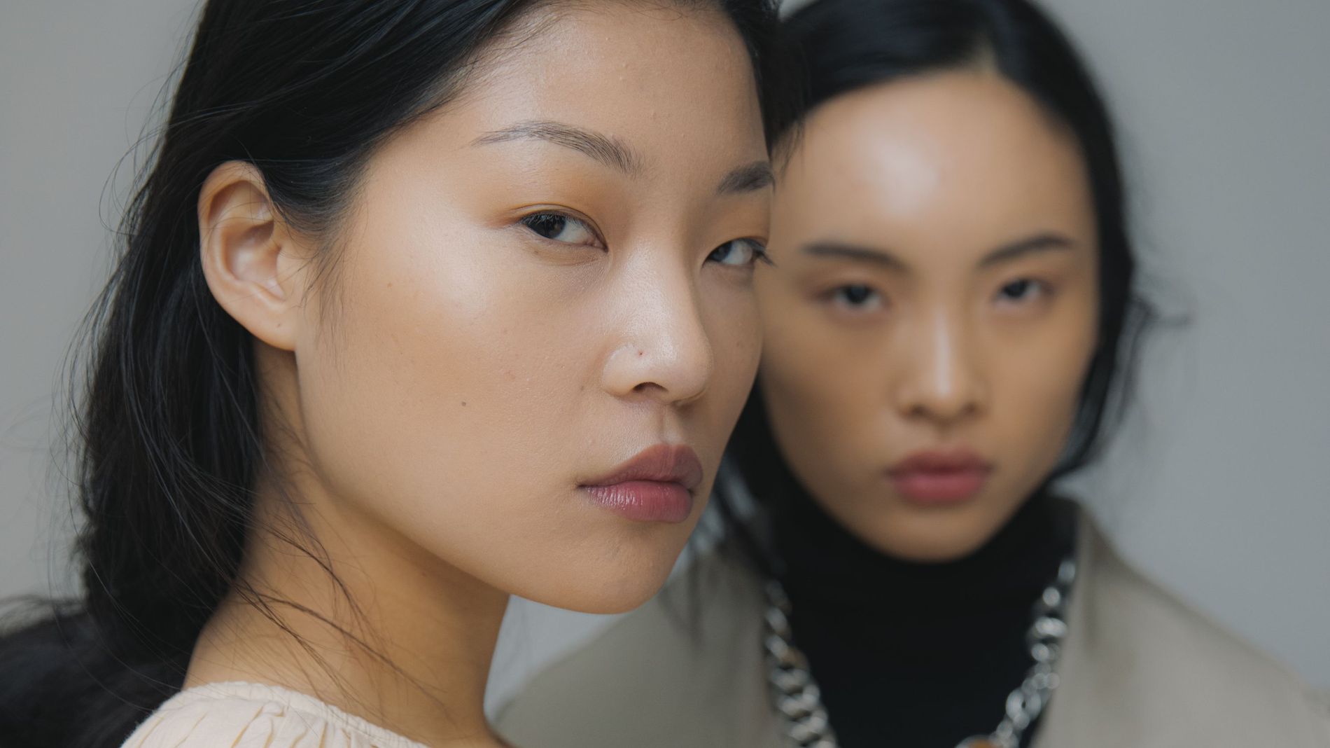Two models pose backstage during Copenhagen fashion week 