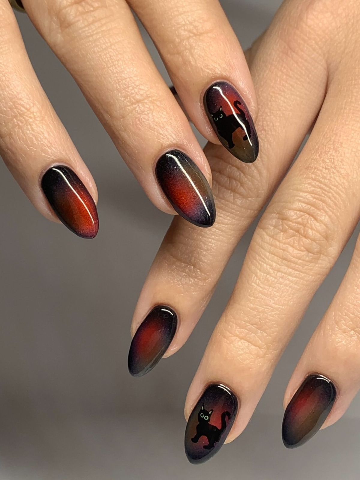 Black cat Halloween nail design
