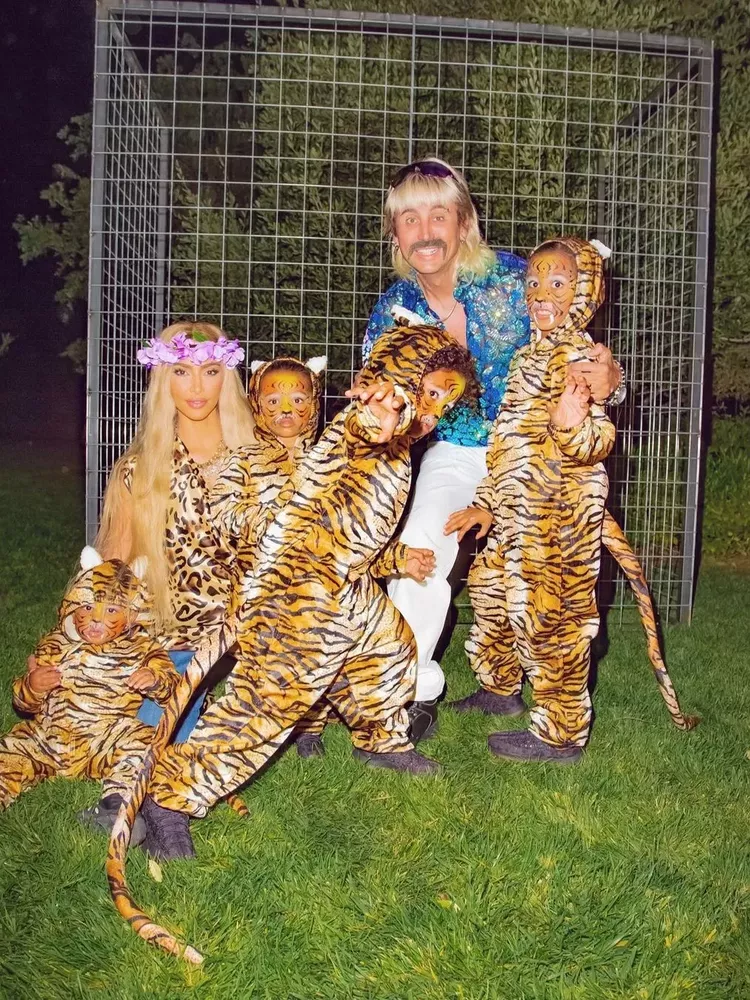 Kim Kardashian and Jonathan Cheban dressed as infamous Tiger King stars Carole Baskin and Joe Exotic. Kim’s children dressed as tigers. 