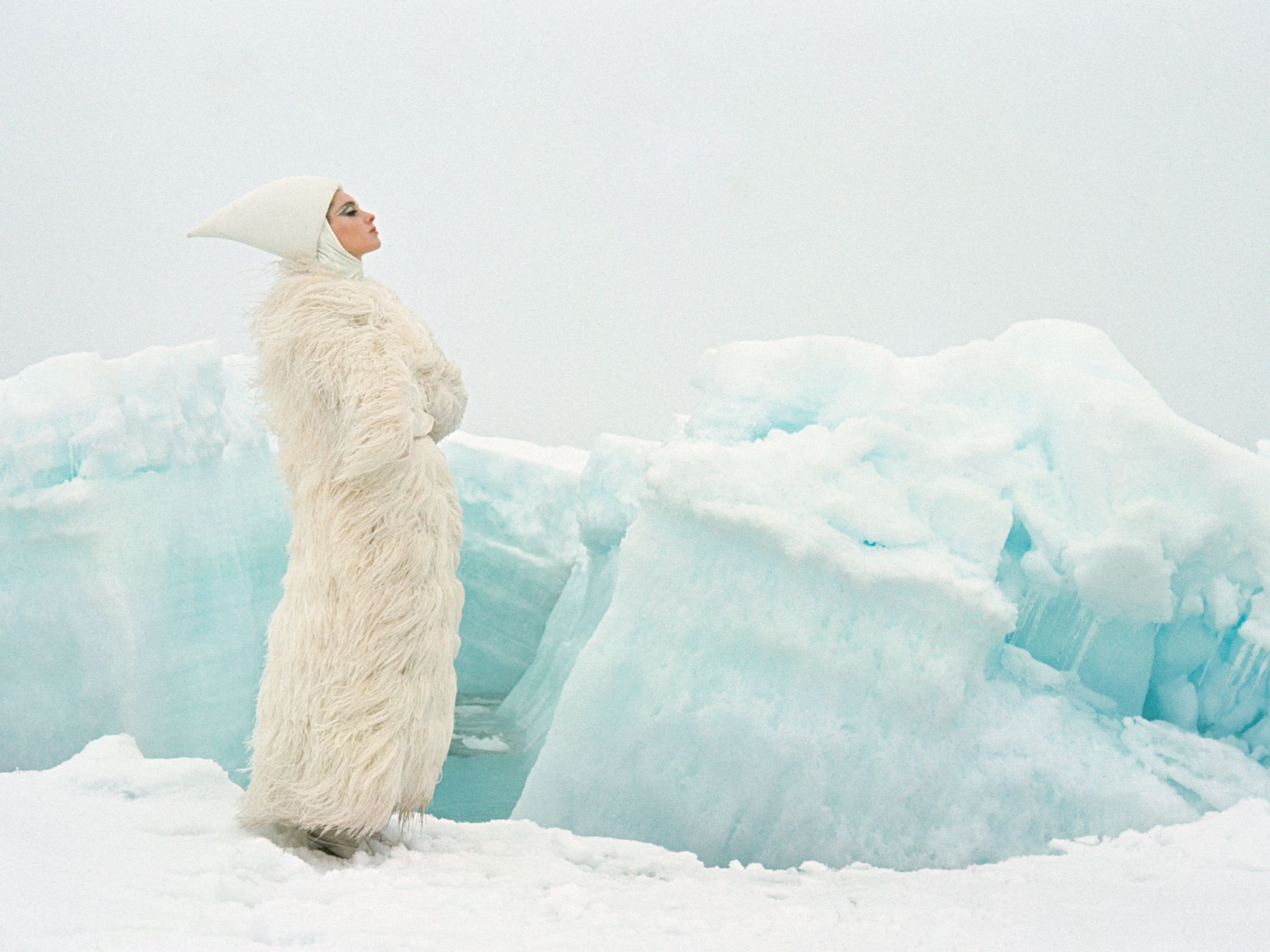 Ice fashion editorial winter snow wooly coat christmas