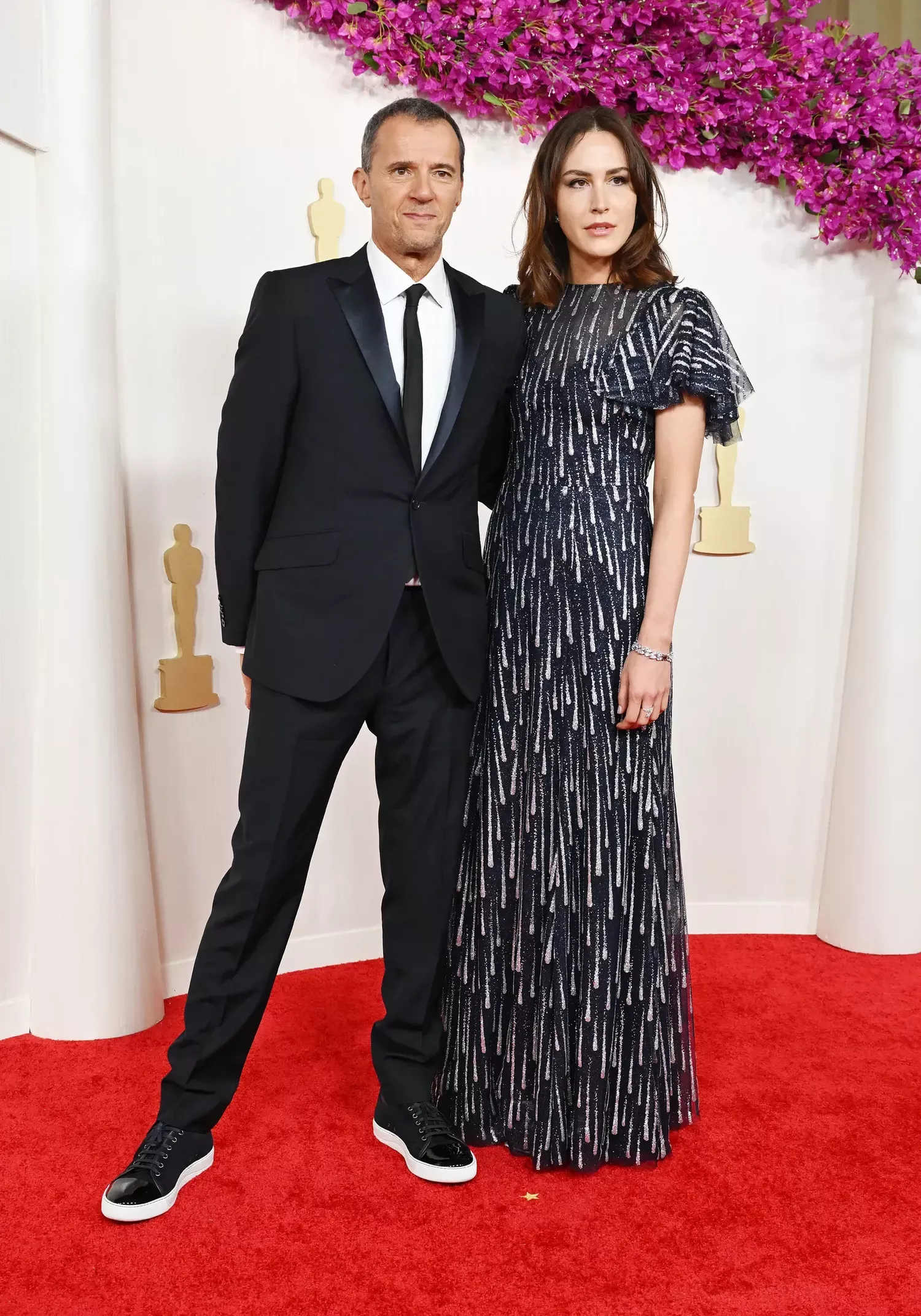 John Battsek and Sarah Thompson on the Oscars 2024 red carpet