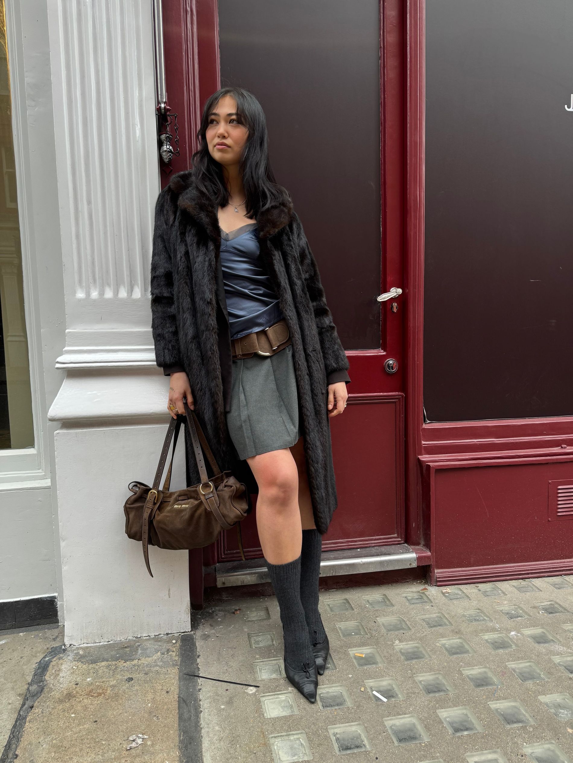 Model Mia Koski standing on the streets of London