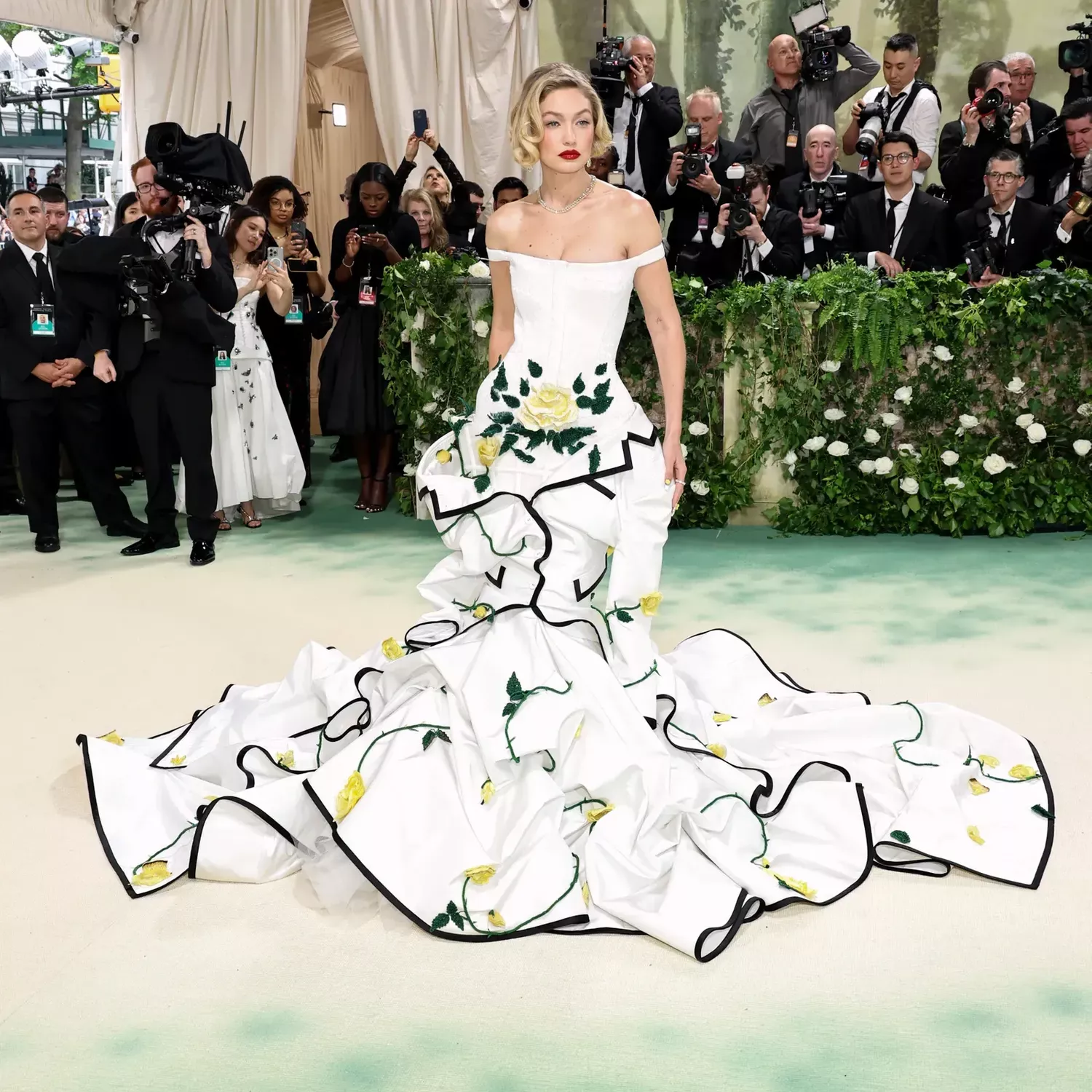 Gigi Hadid in Thom Browne and Chopard