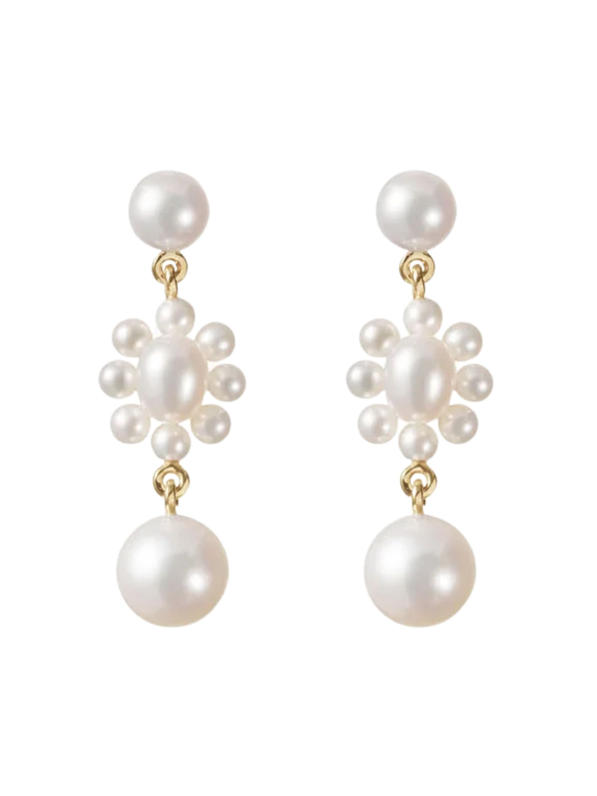 Pearl earrings with clusters set in gold from Sophie Bille Brahe against a white background