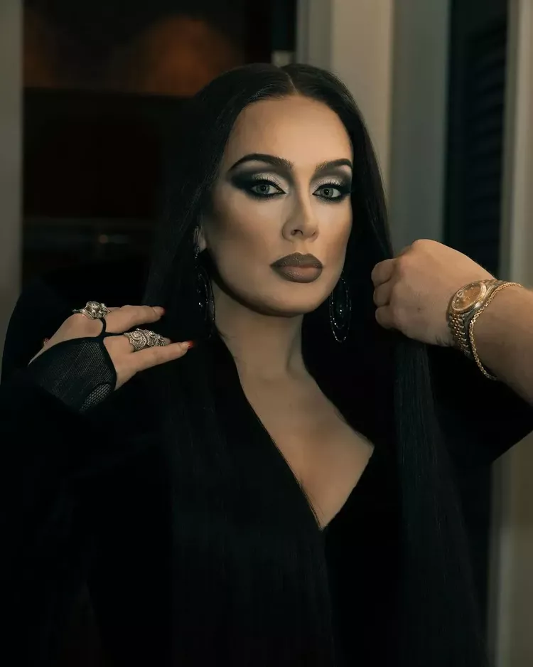 Adele dressed up as Morticia from The Addams Family.