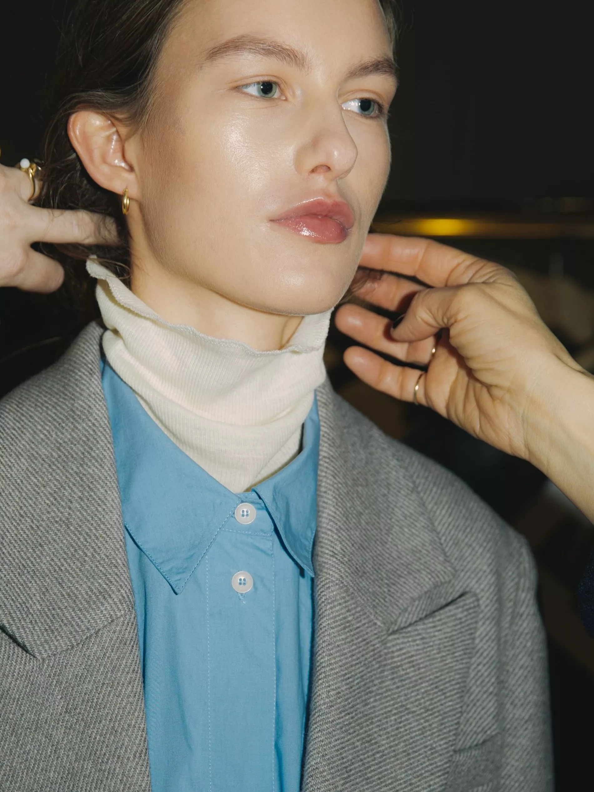 Model wearing luminous foundation backstage at Small Studio's fall/winter 2025 show