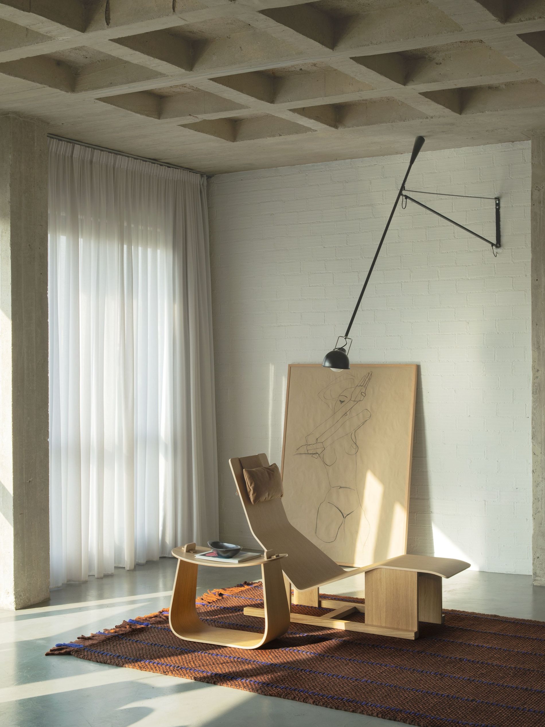 Layered x Massproductions rug collection pictured in a room