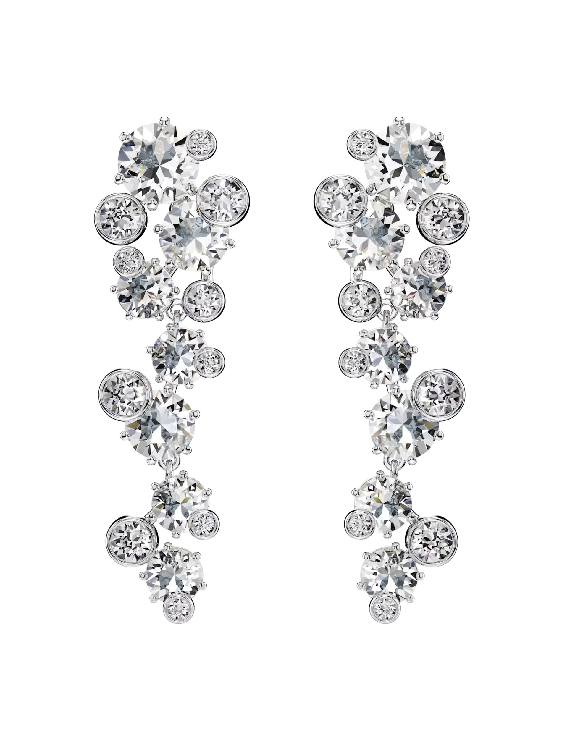 crystal statement earrings by Swarovski against a white background