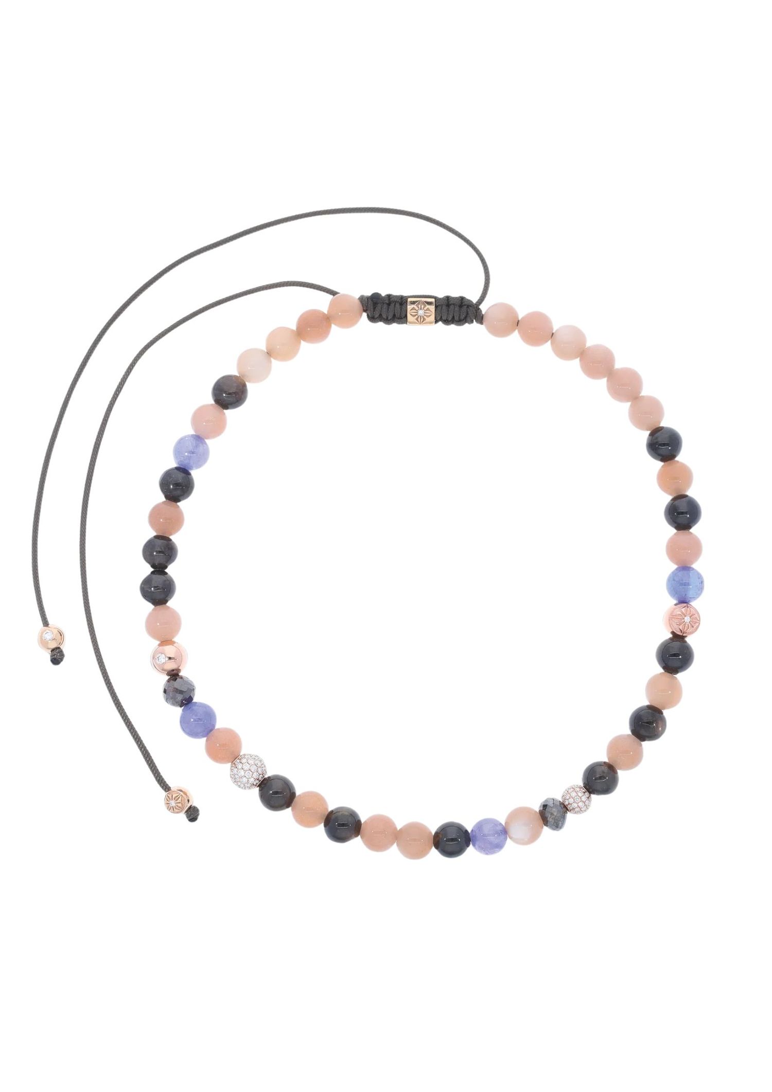 A close-fitting line of light and texture, the SHAMBALLA Choker balances the warmth of 18K rose gold with a considered spectrum of gemstones.