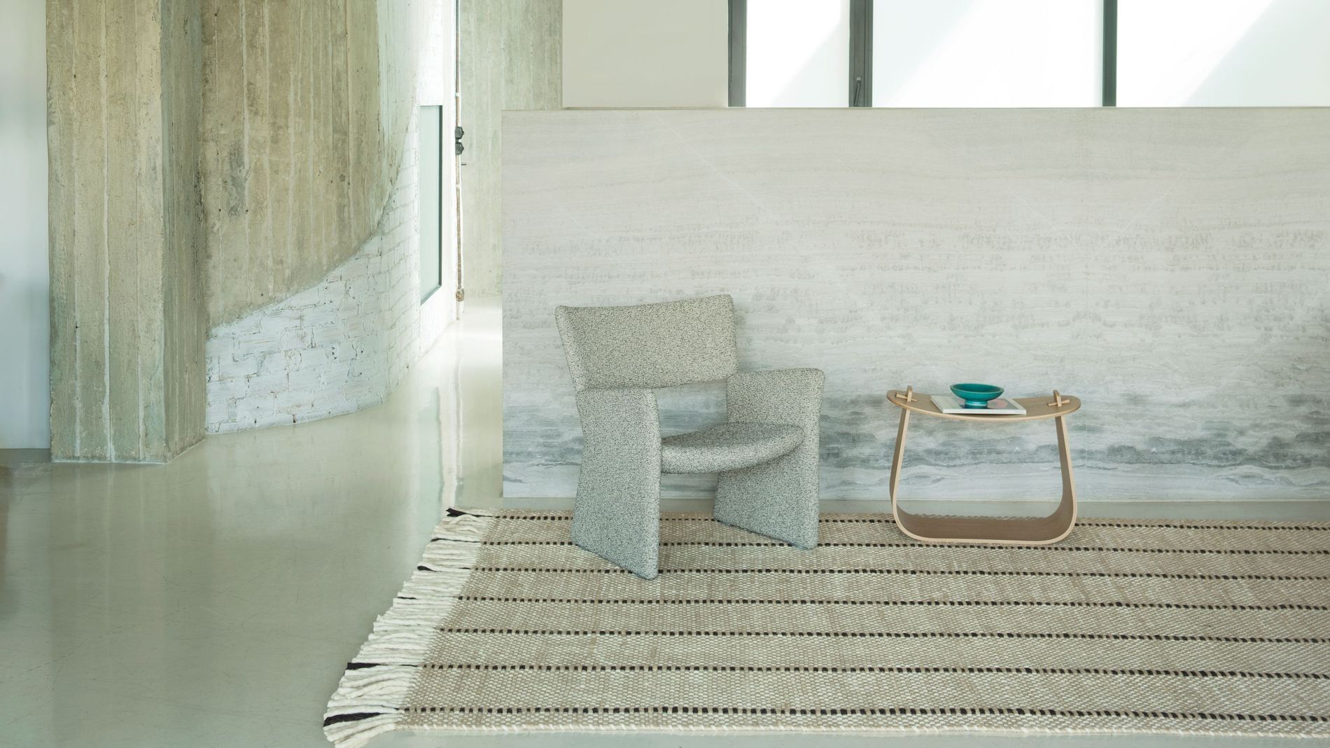 Layered x Massproductions rug collaboration pictured in a room