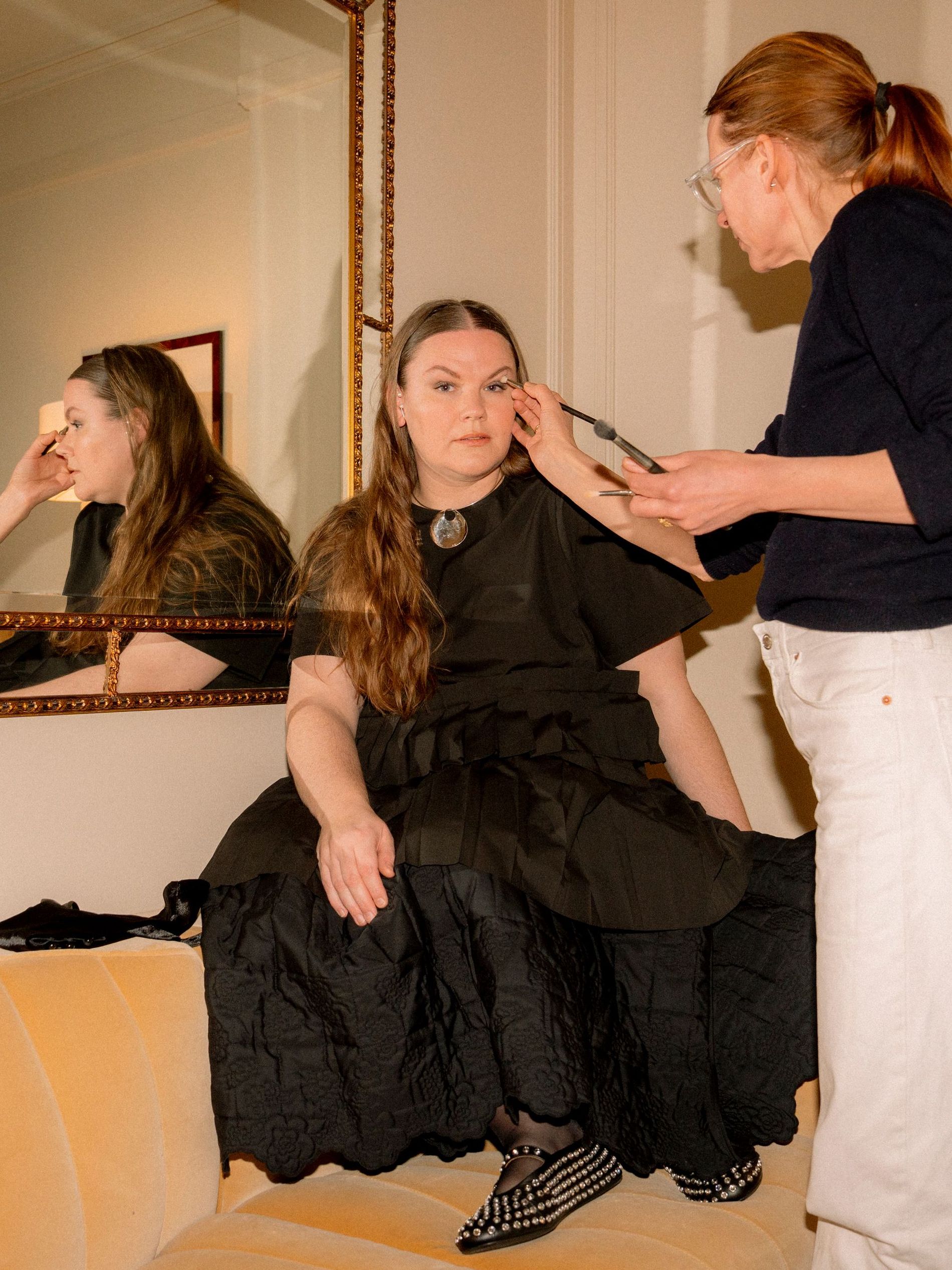 Astrid Andersen, creative director of Stel getting ready in her hotel room