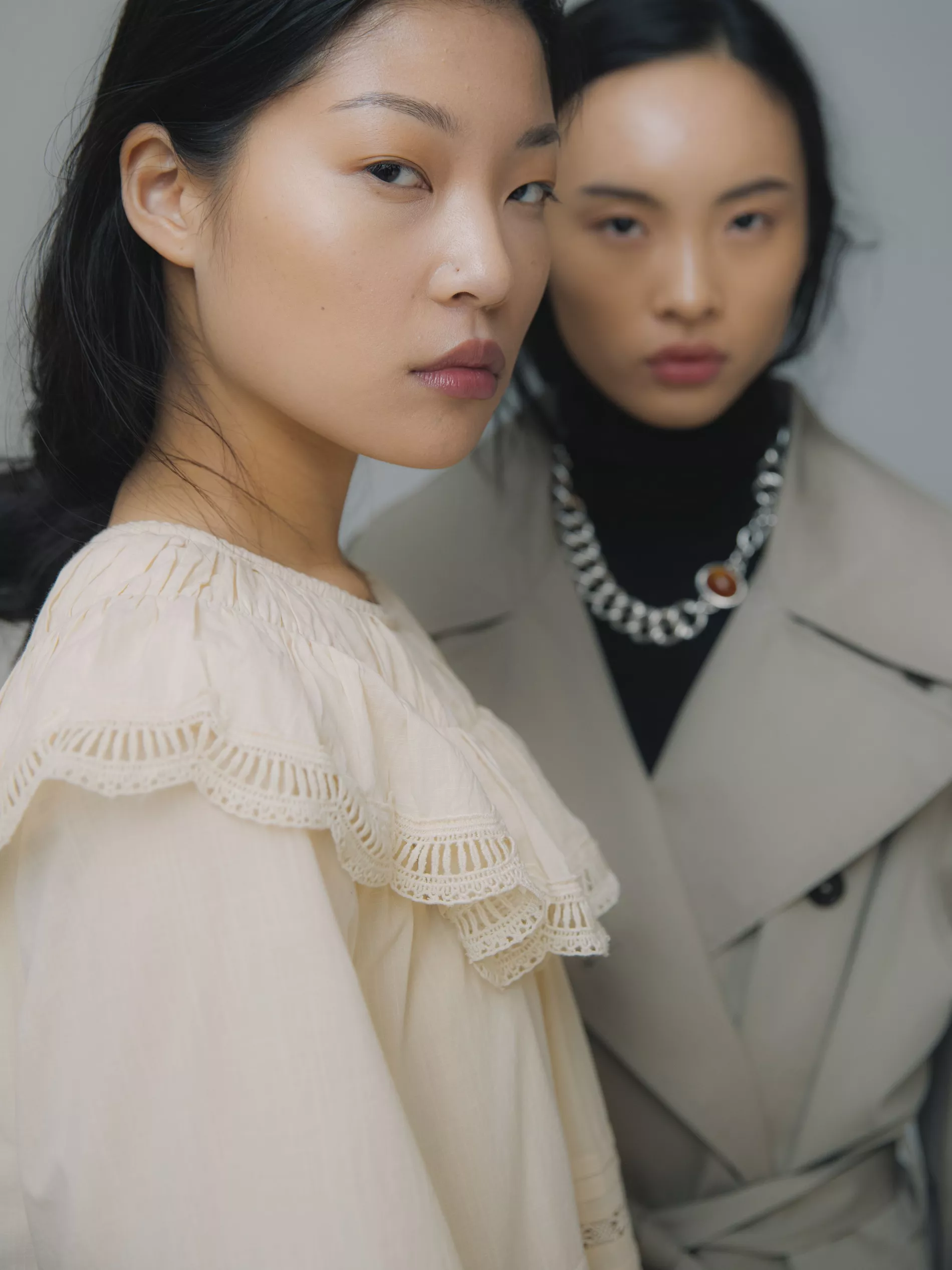 Two models pose backstage during Copenhagen fashion week 