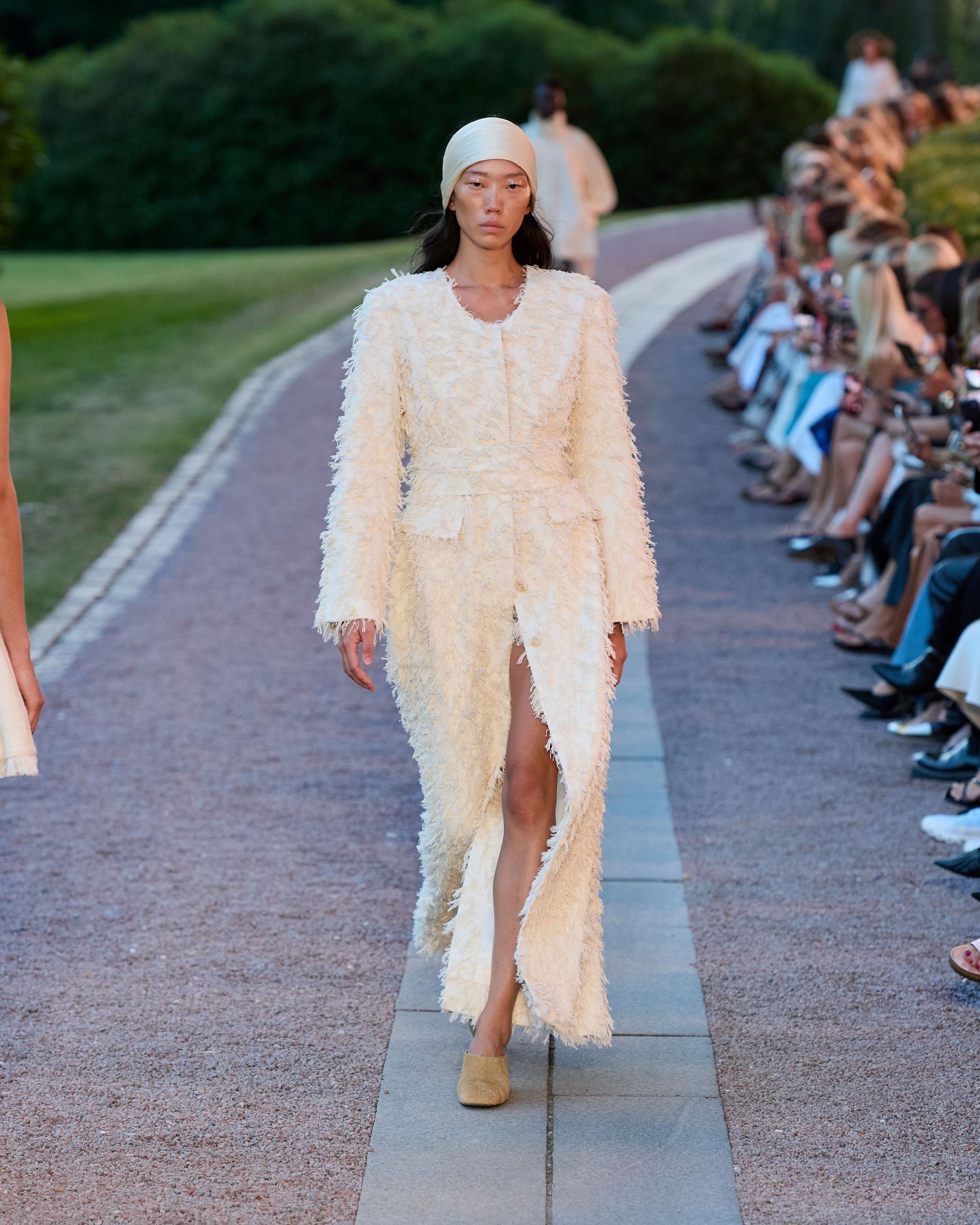 Textured long white cape
