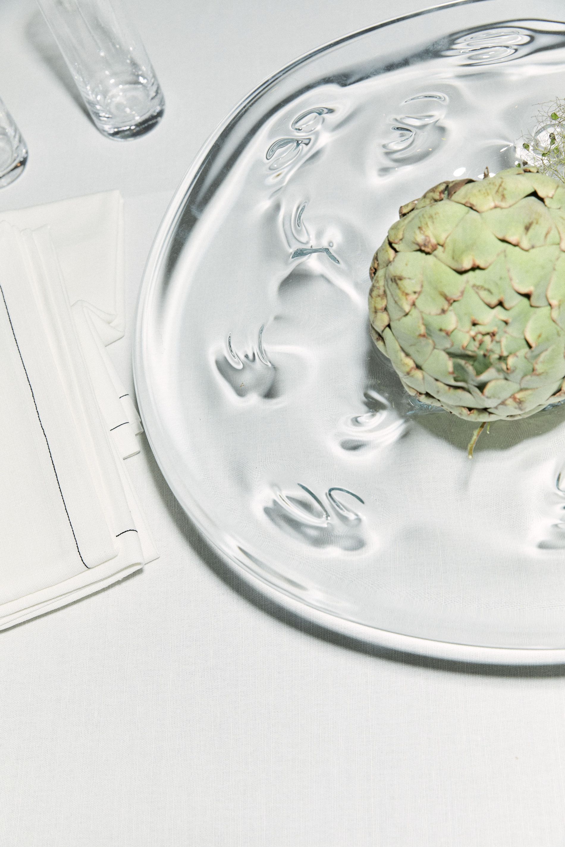 Table scape of Sophia Roe's interior collaboration, highlighting the glassware plate