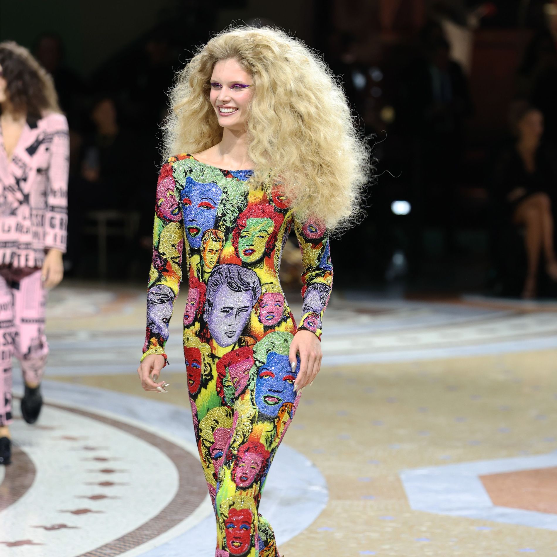 Ida Heiner in Milan fashion week wearing Andy Warhol-inspired pop art bodysuit with a Marilyn Monroe and James Dean print from Versace's Spring 2018 tribute collection